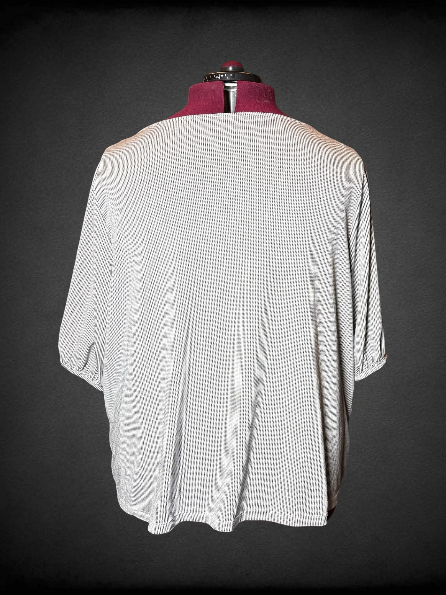 4X H&M beige flowy blouse with black spotted pattern