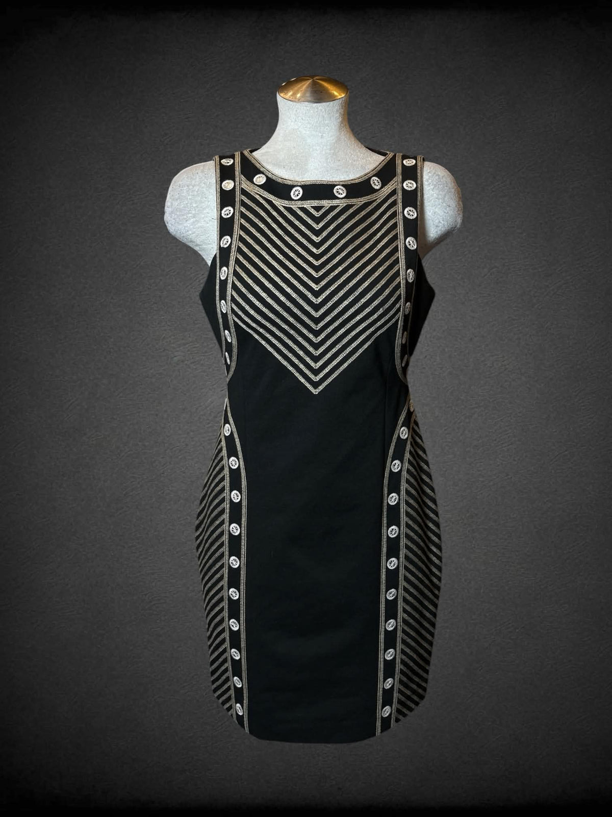L BCBG Max Azria black short dress with brown woven detailing, and zipper and clasp on back