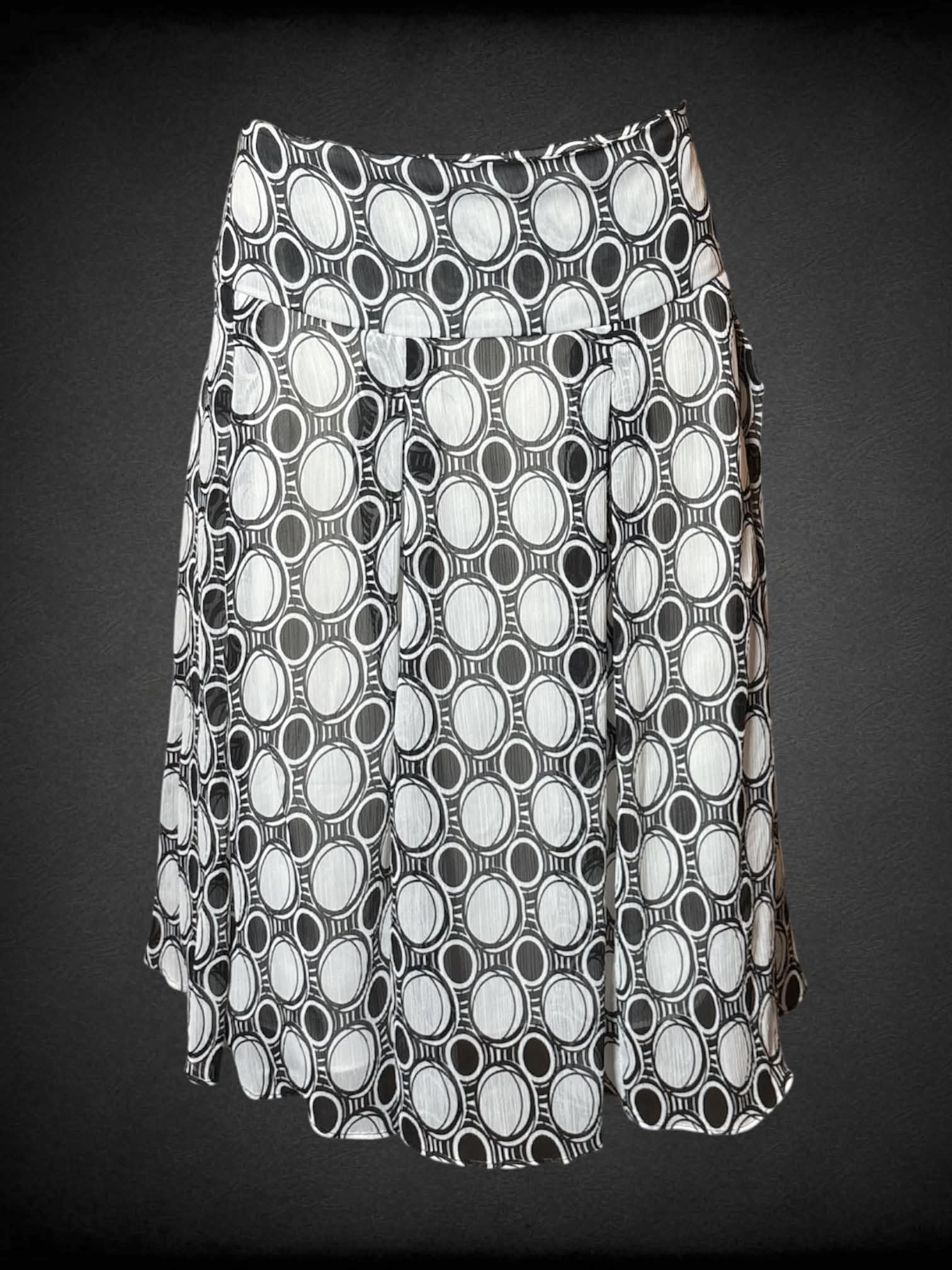 L DressBarn Y2K white flowy skirt with black circular design, and zipper on side