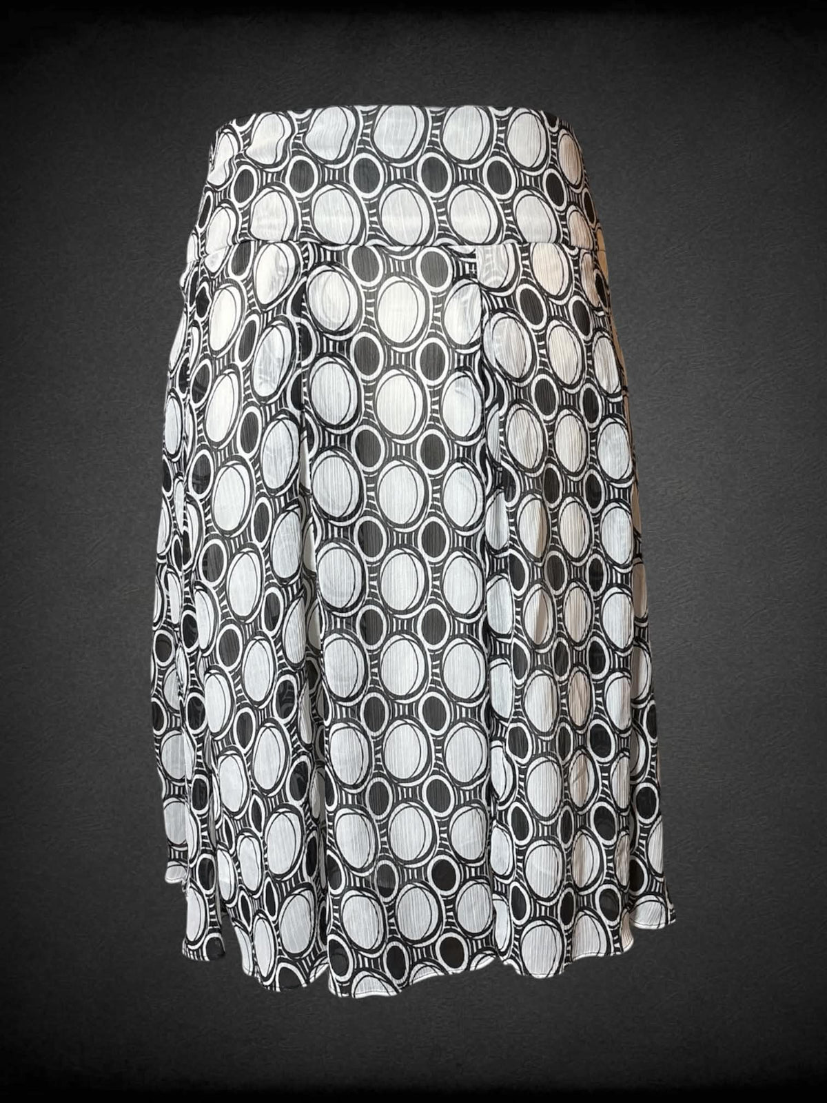 L DressBarn Y2K white flowy skirt with black circular design, and zipper on side