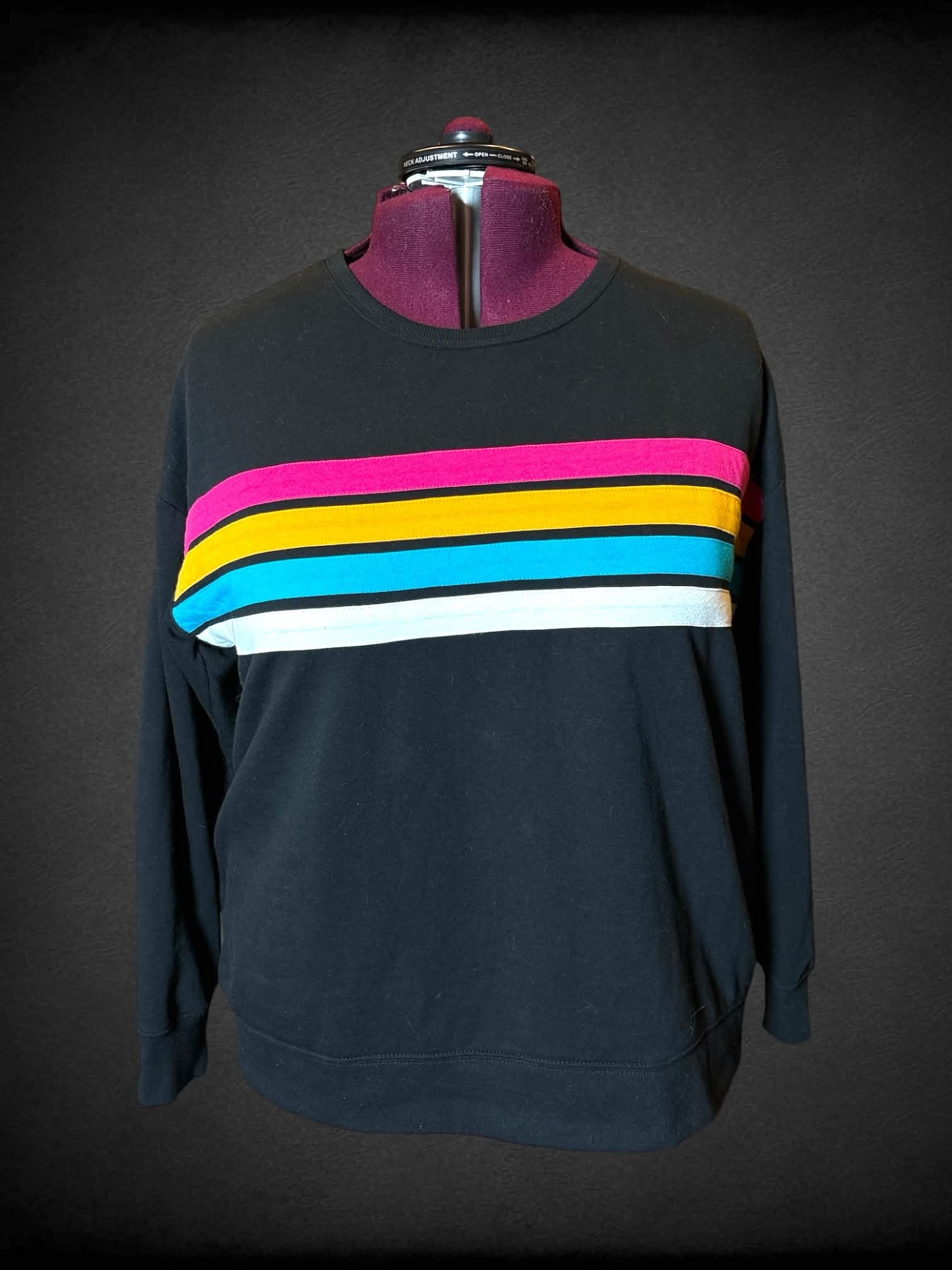 3X Torrid black long-sleeve crewneck sweater with multicolor stripes on front