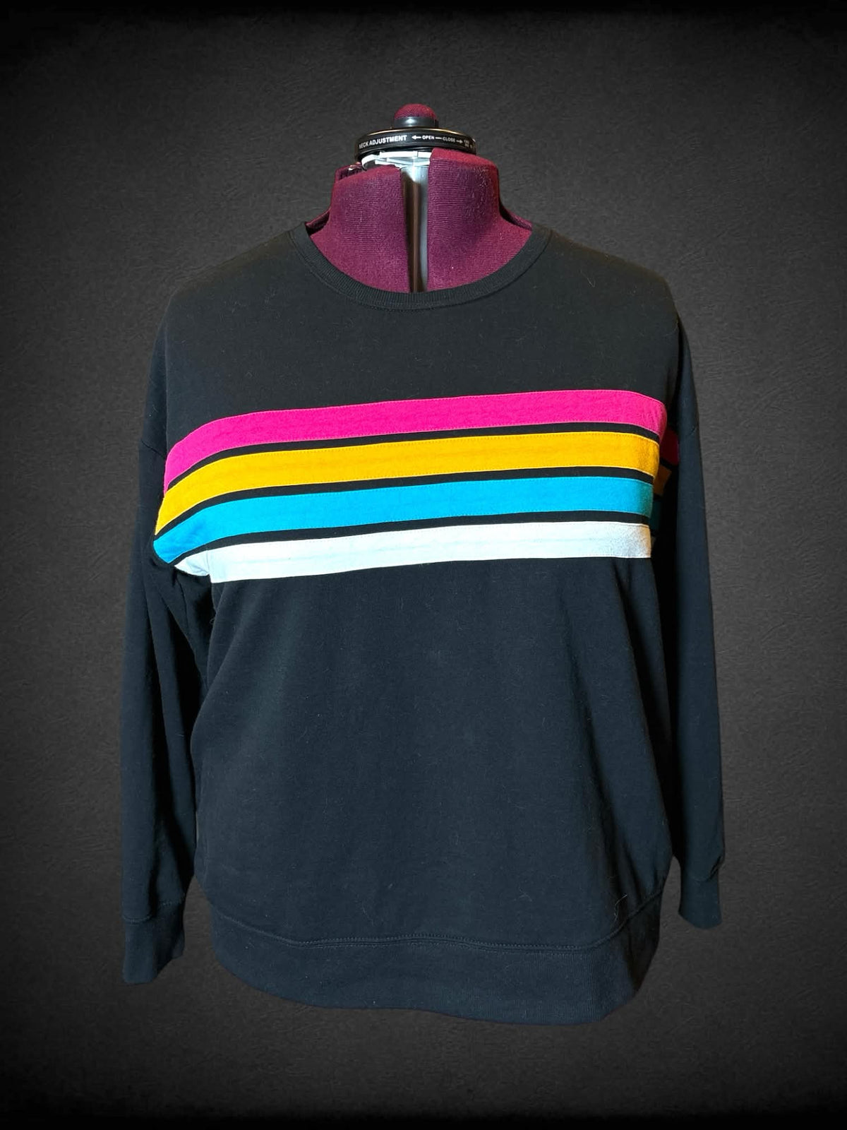 3X Torrid black long-sleeve crewneck sweater with multicolor stripes on front