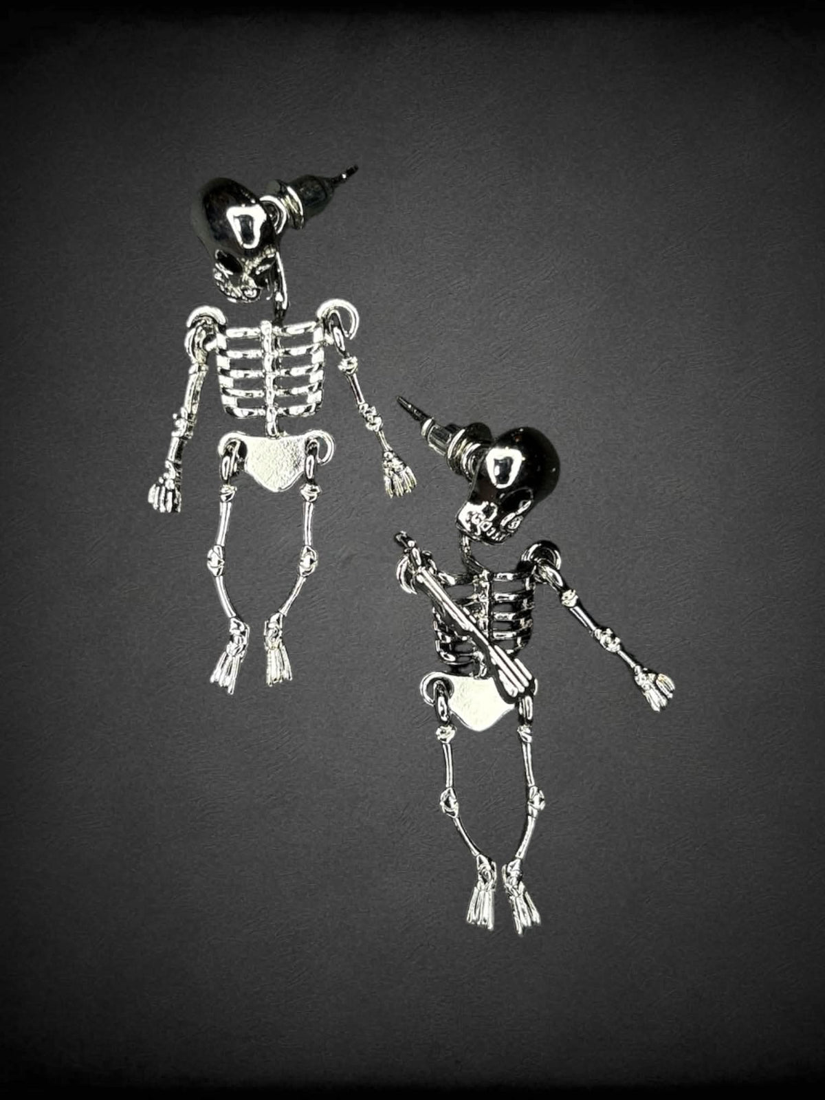 Silver skeleton earrings