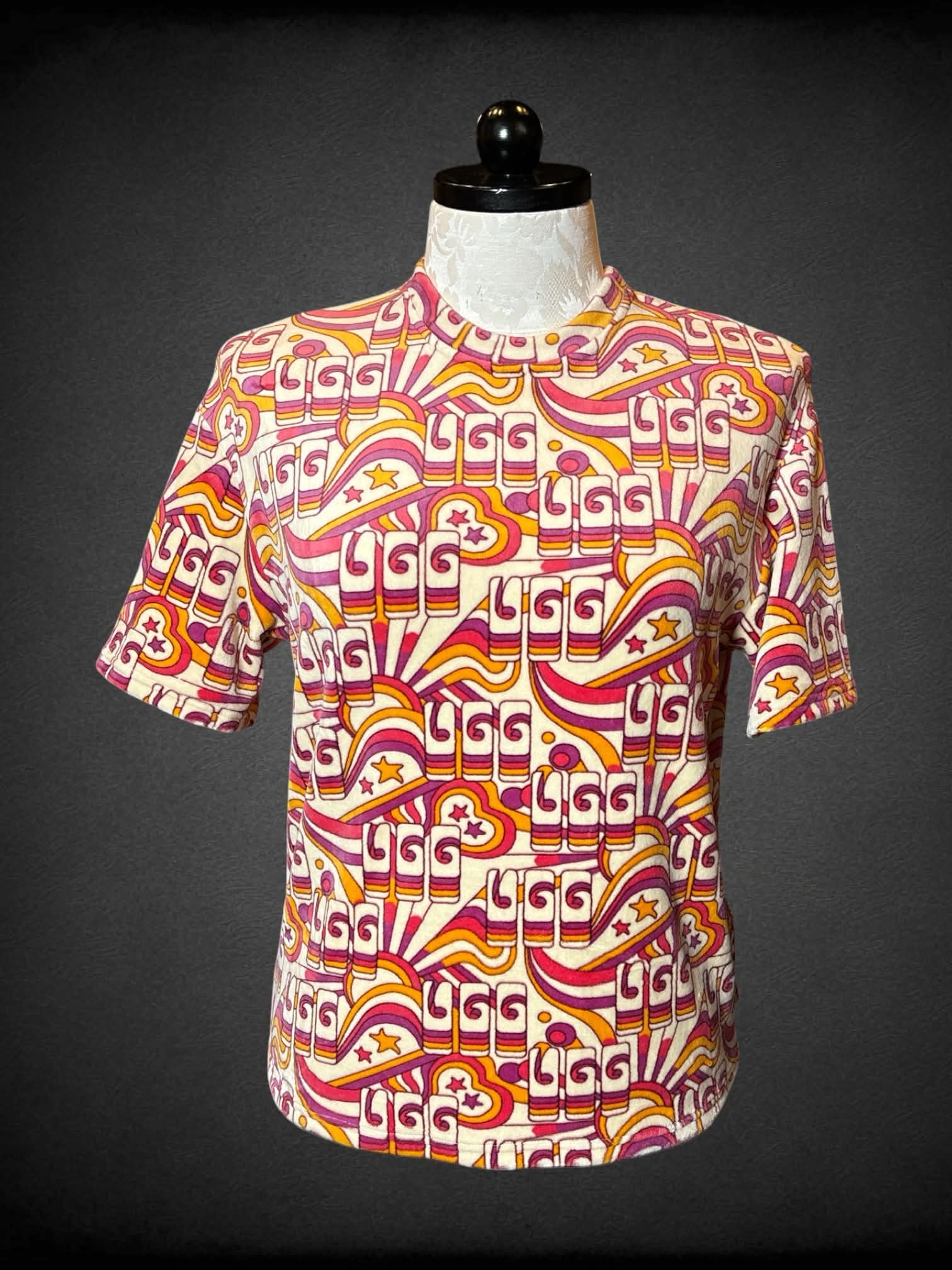 1X Ugg off white short sleeve fuzzy top with “Ugg” and groovy design