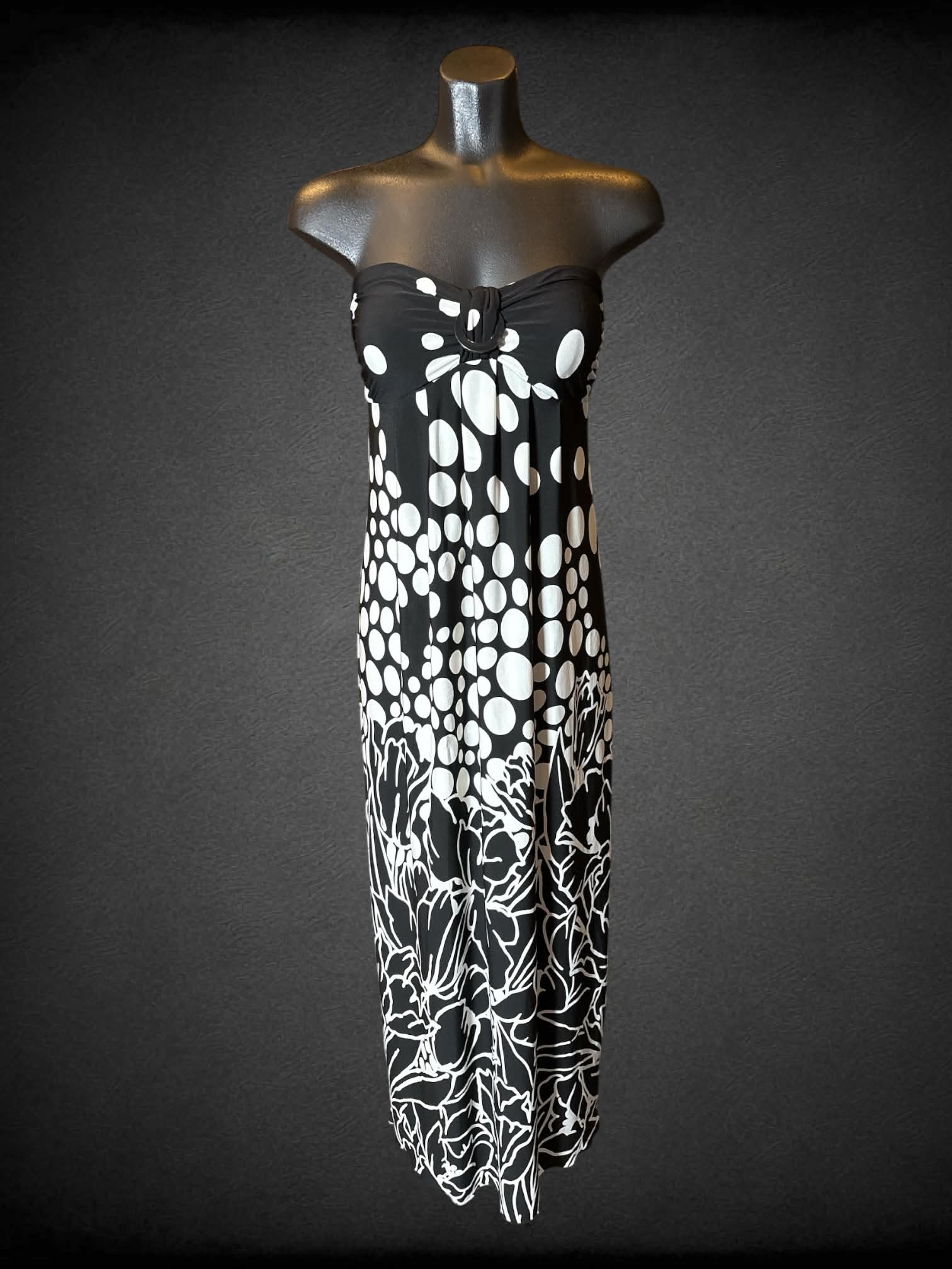 M Saint Tropez Y2K black sleeveless dress with cups, faux buckle in middle, and white polka dots and design on bottom