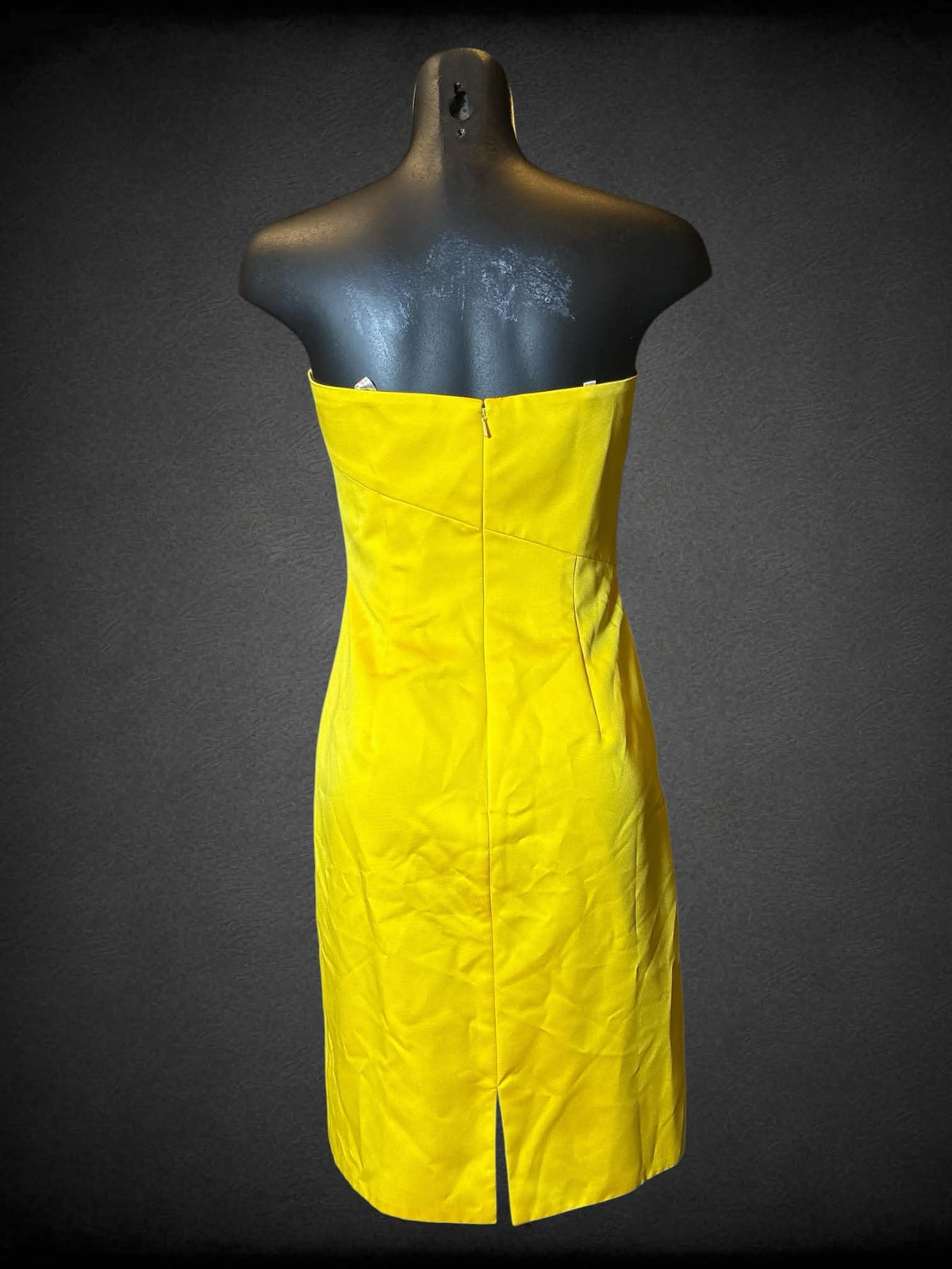S Milano yellow sleeveless dress with big bedazzled bow on front, and zipper on back