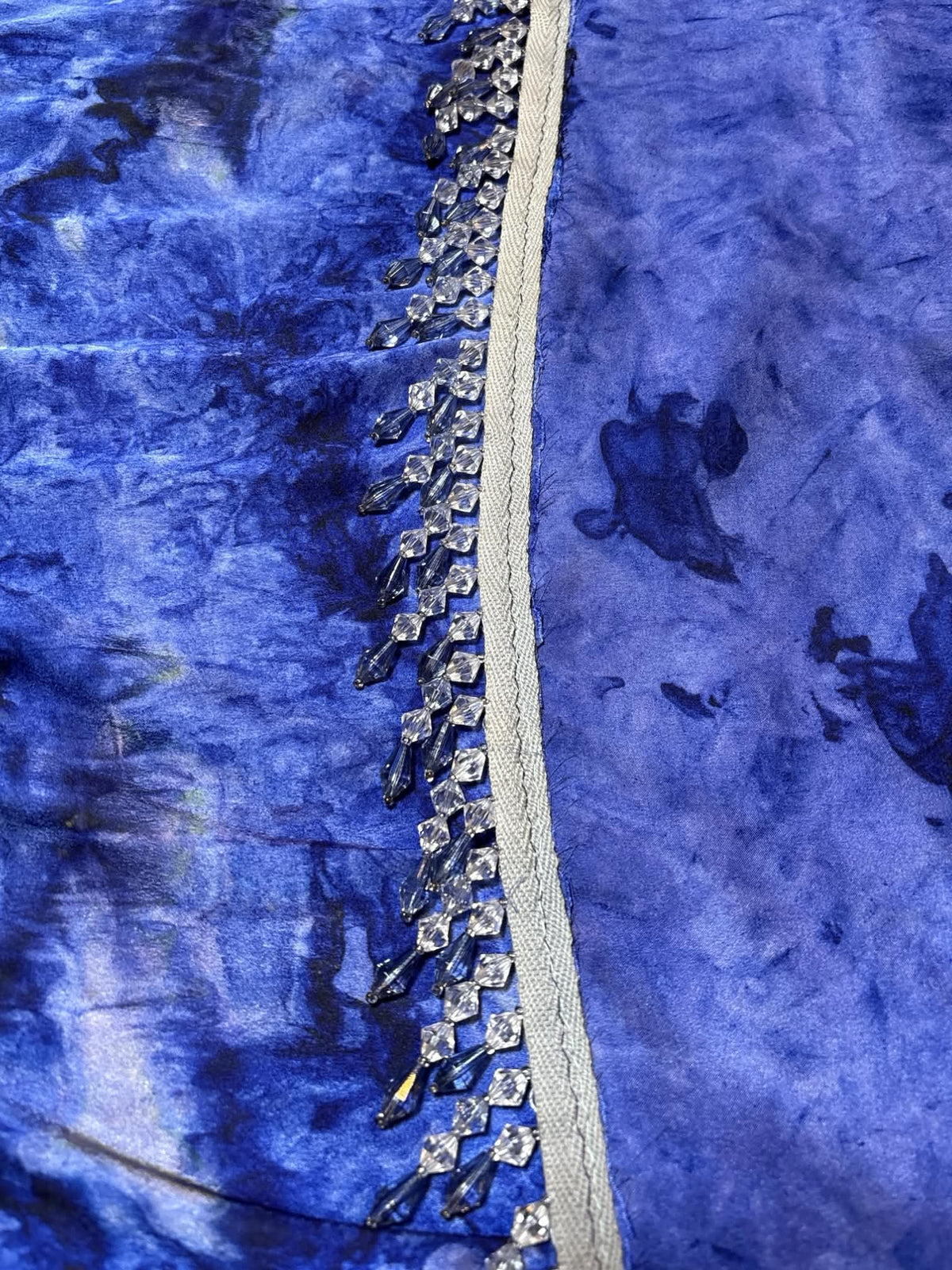 Dark blue long shawl with tie dye design and beading on ends