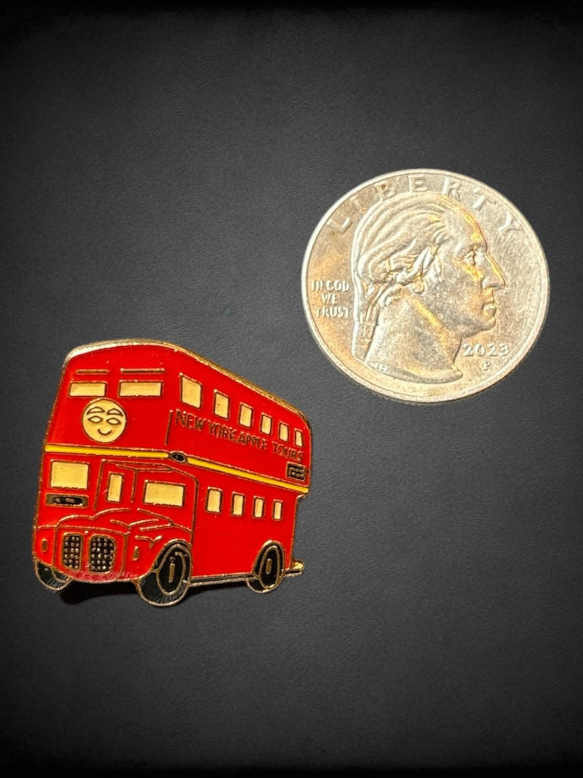 Red and gold tone double decker tour bus pin