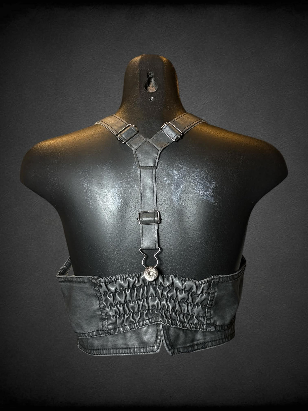 M Last Kiss grey faux leather vest top with buttons on front, pockets, and adjustable straps