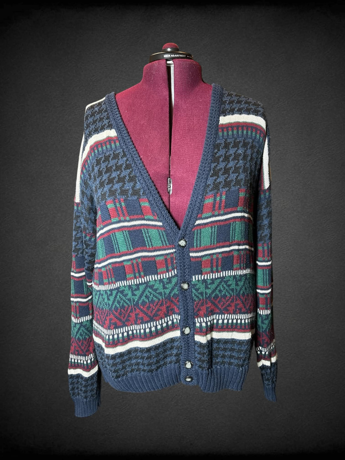 4X Storm Warning navy blue knit cardigan with houndstooth and plaid pattern