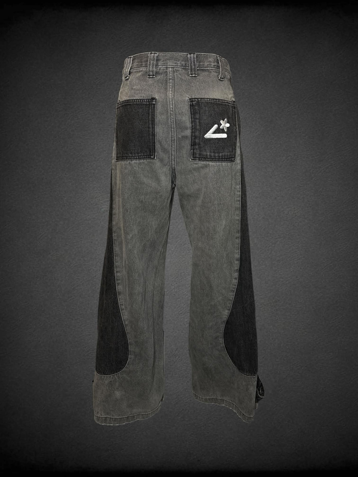 S Liquid Lagoon grey high-waisted jeans with dark wavy design, and embroidery on back pocket