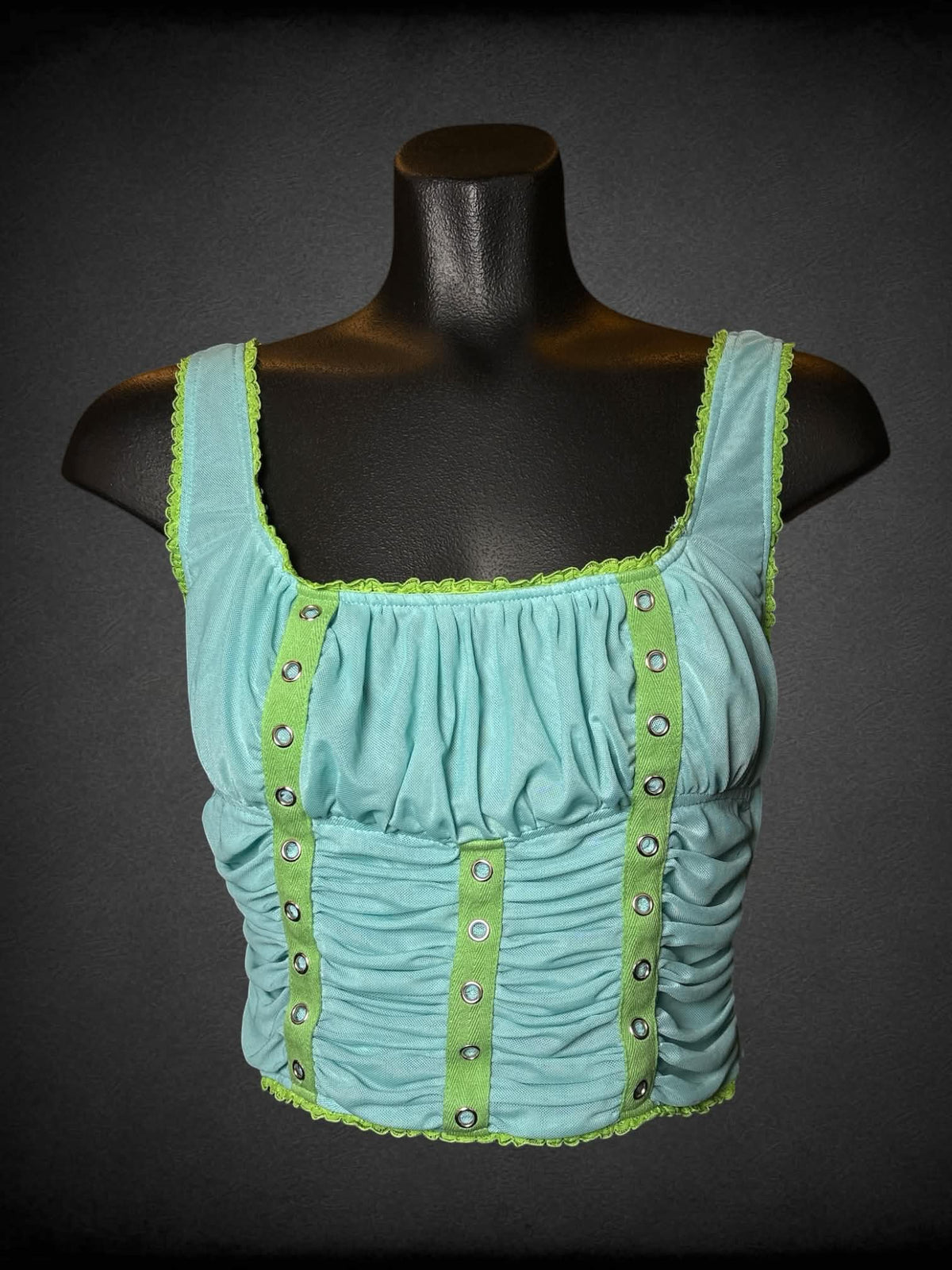 M Tunnel Vision aqua mesh cropped tank top with cinched design, green and metallic detailing, and zipper on side