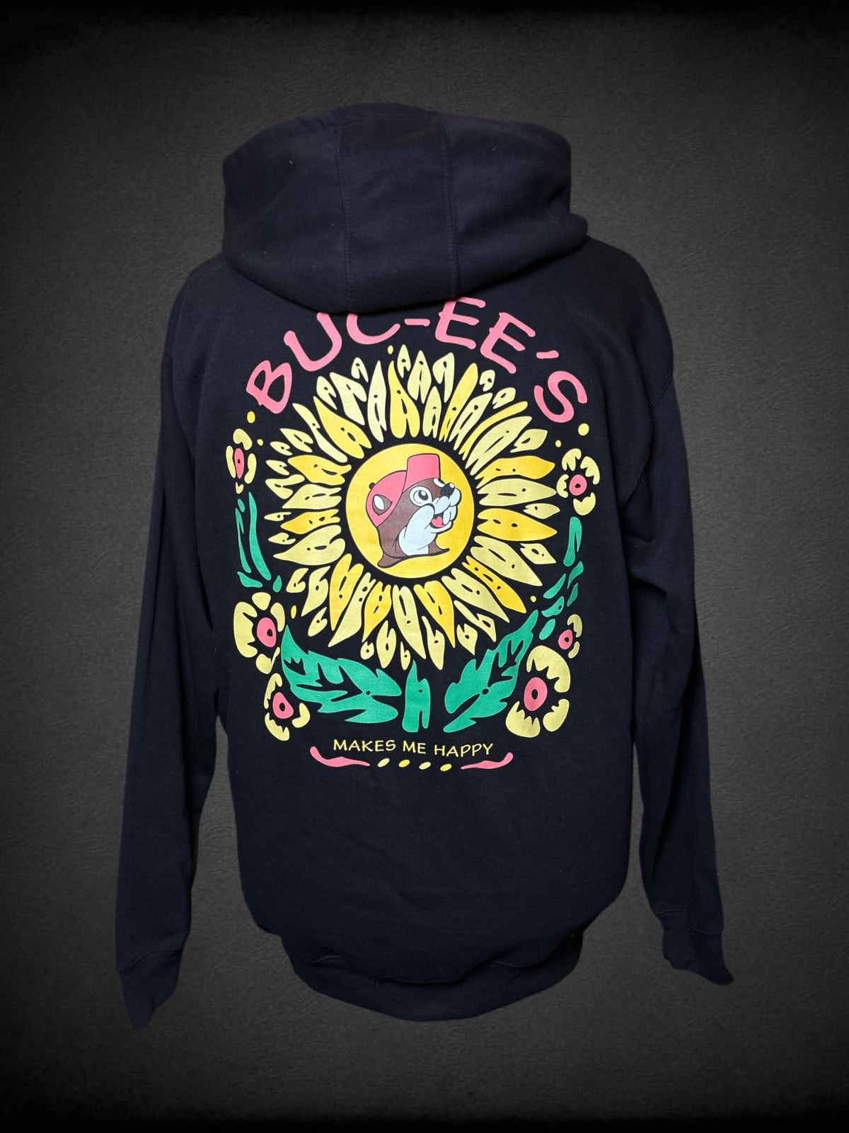 2X Buc-ee’s black pullover hoodie with sunflower “Buck-ee’s Makes Me Happy” graphic on back