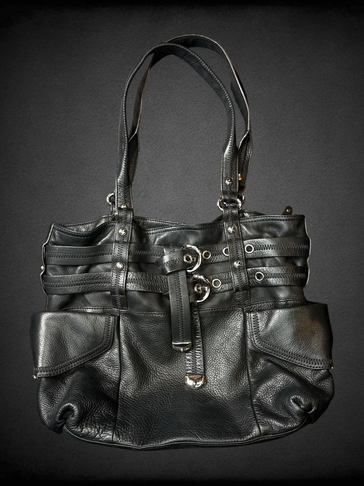 B. Makowsky designer black leather shoulder bag with zipper pockets and magnetic snap button