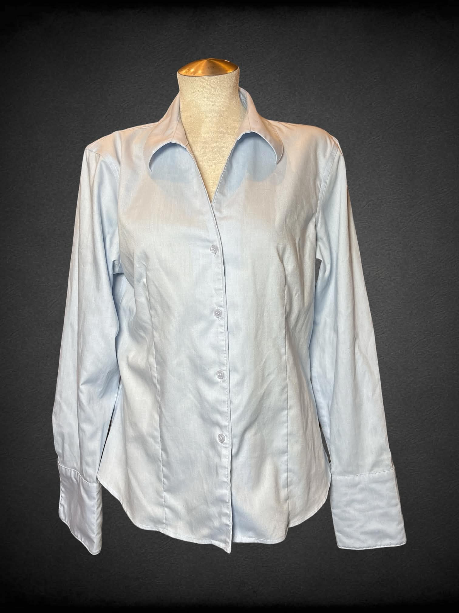 L Calvin Klein light blue button-up shirt