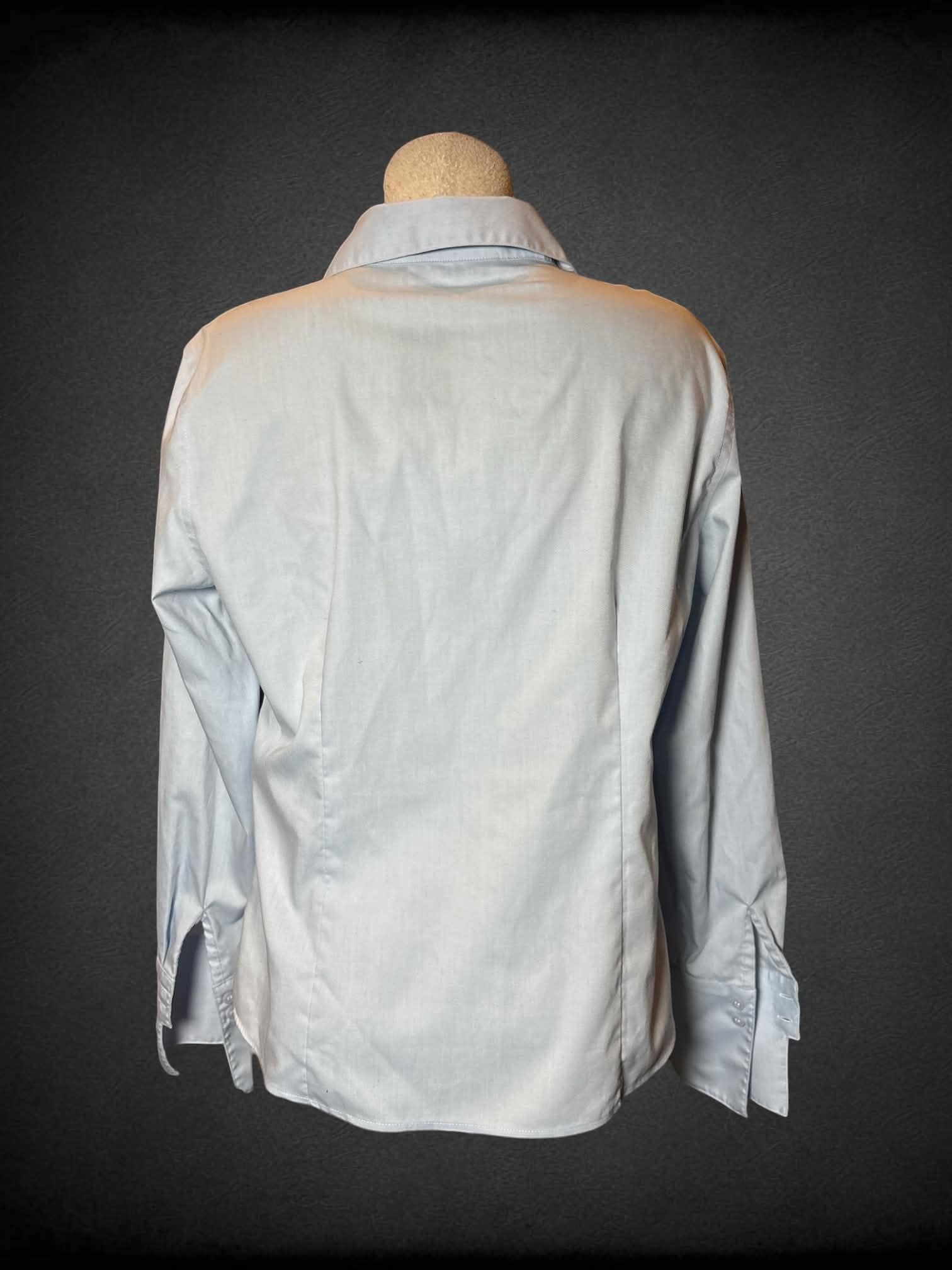 L Calvin Klein light blue button-up shirt
