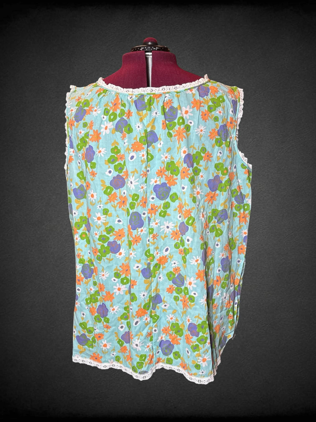 3X light blue flowy blouse with lace hemline, and floral pattern
