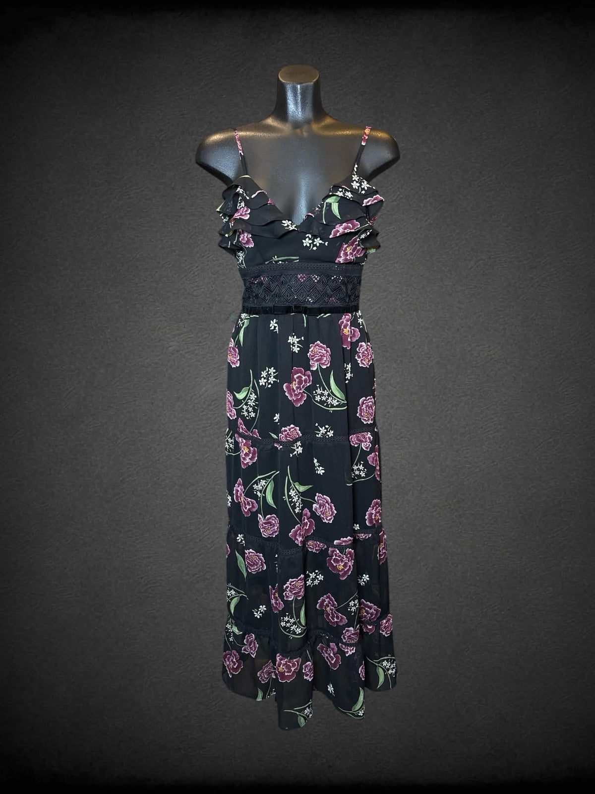 S Shift black dress with floral pattern, ruffle design on front, zipper on back, and adjustable straps