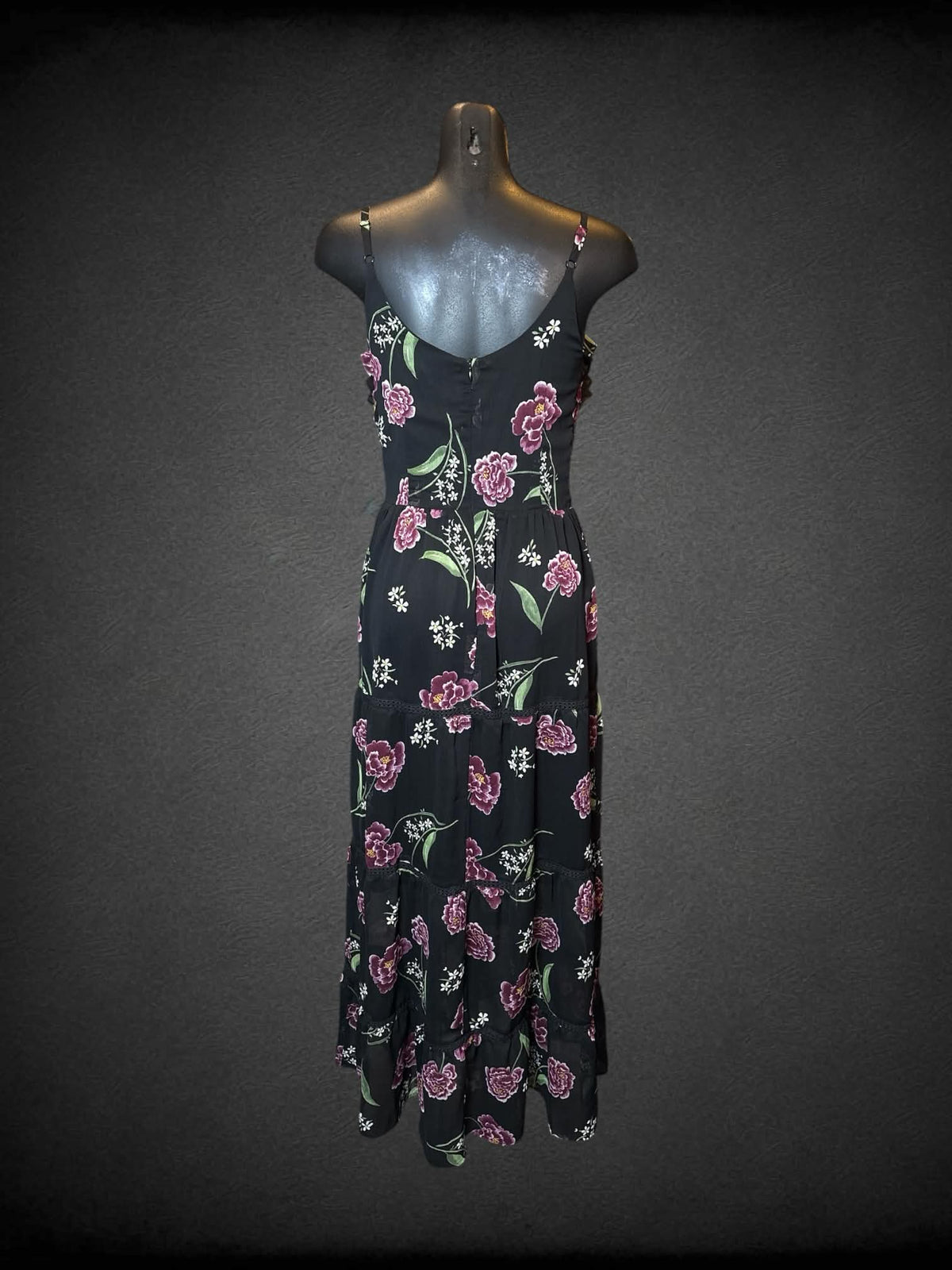 S Shift black dress with floral pattern, ruffle design on front, zipper on back, and adjustable straps