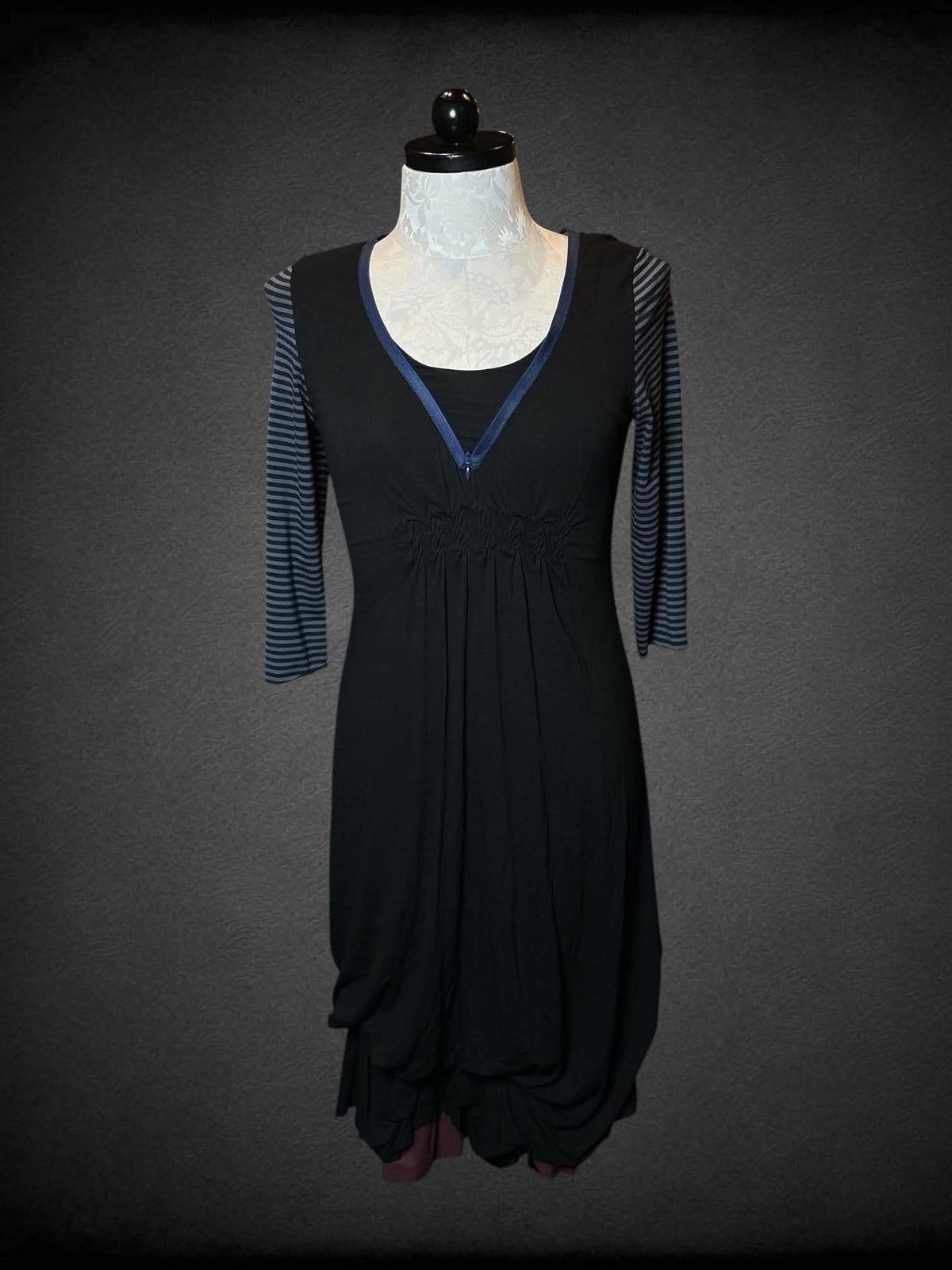 1X LanVie black dress with striped sleeves, ruffle hemline, and zipper neckline