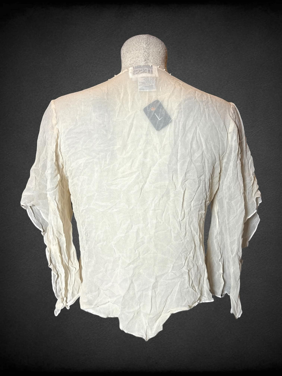 L Tess vintage cream sheer silk blouse with bell sleeves, beaded detailing on neckline, and pink paisley embroidery on front