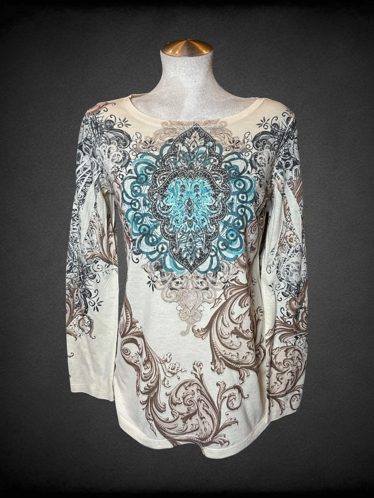 L B.L.E.U. cream long-sleeve shirt with bedazzled Mandela design on front