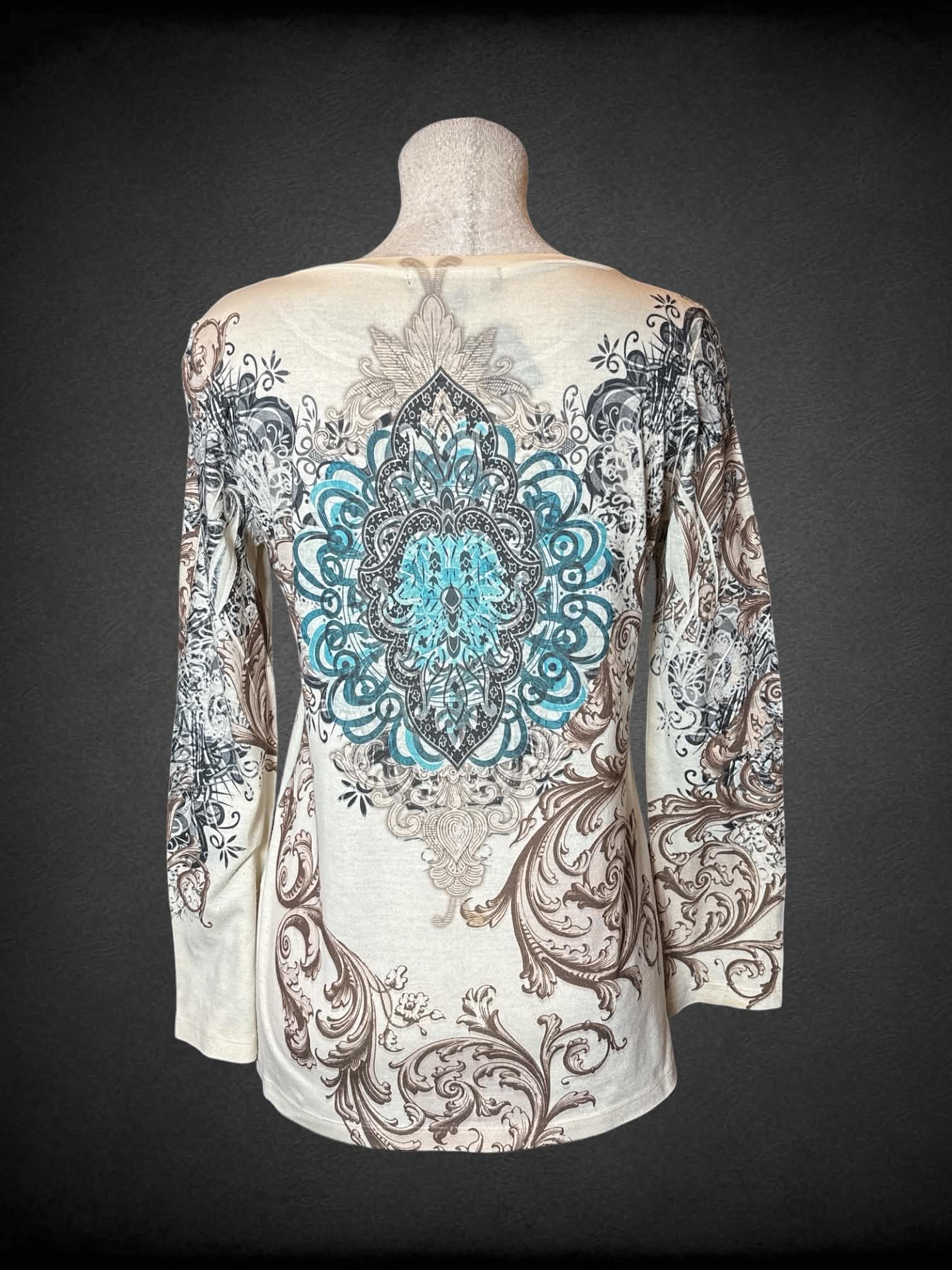L B.L.E.U. cream long-sleeve shirt with bedazzled Mandela design on front