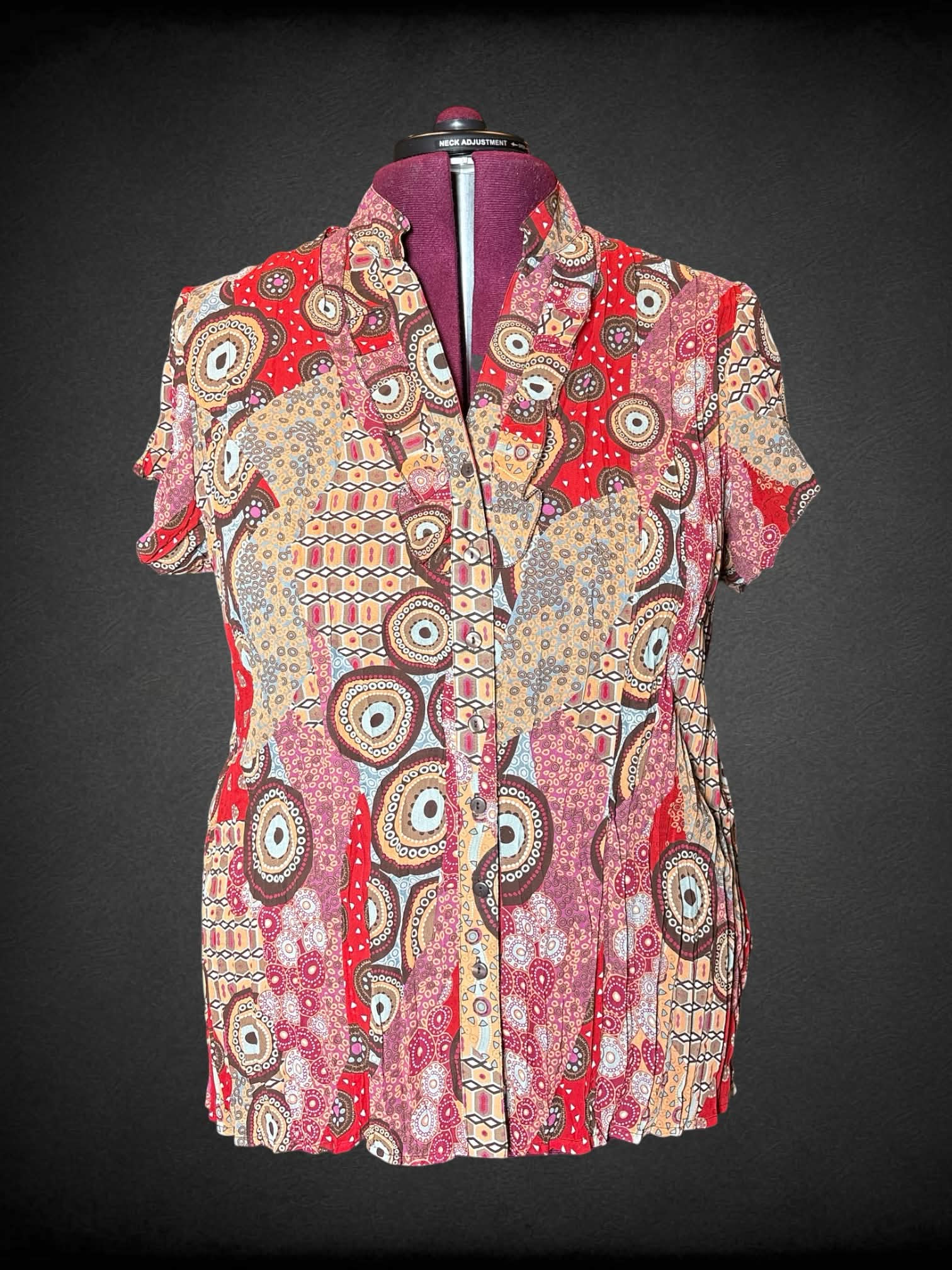 2X Notations Y2K red pleated button-up blouse with ruffle neckline, and abstract pattern