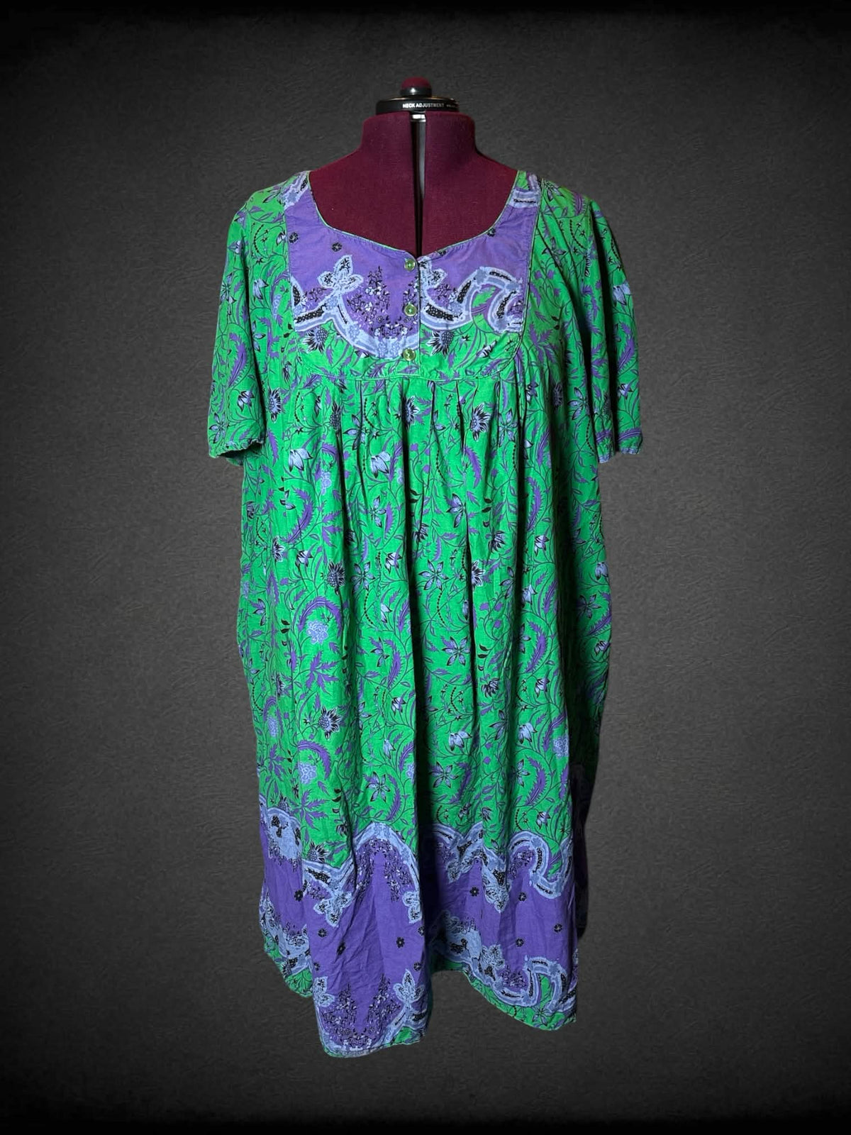 4X Only Necessities green & purple dress with floral design, pockets, and buttons on front