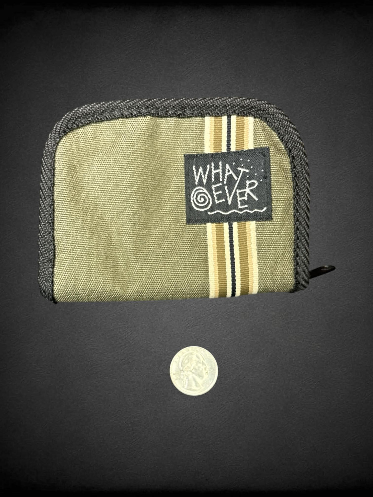Whatever green zip-up wallet with striped design