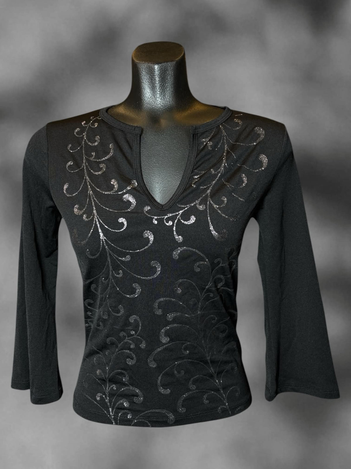 M Rampage Clothing Co vintage black fitted long-sleeve shirt with sparkly Y2K floral vector design on front, and bell sleeves