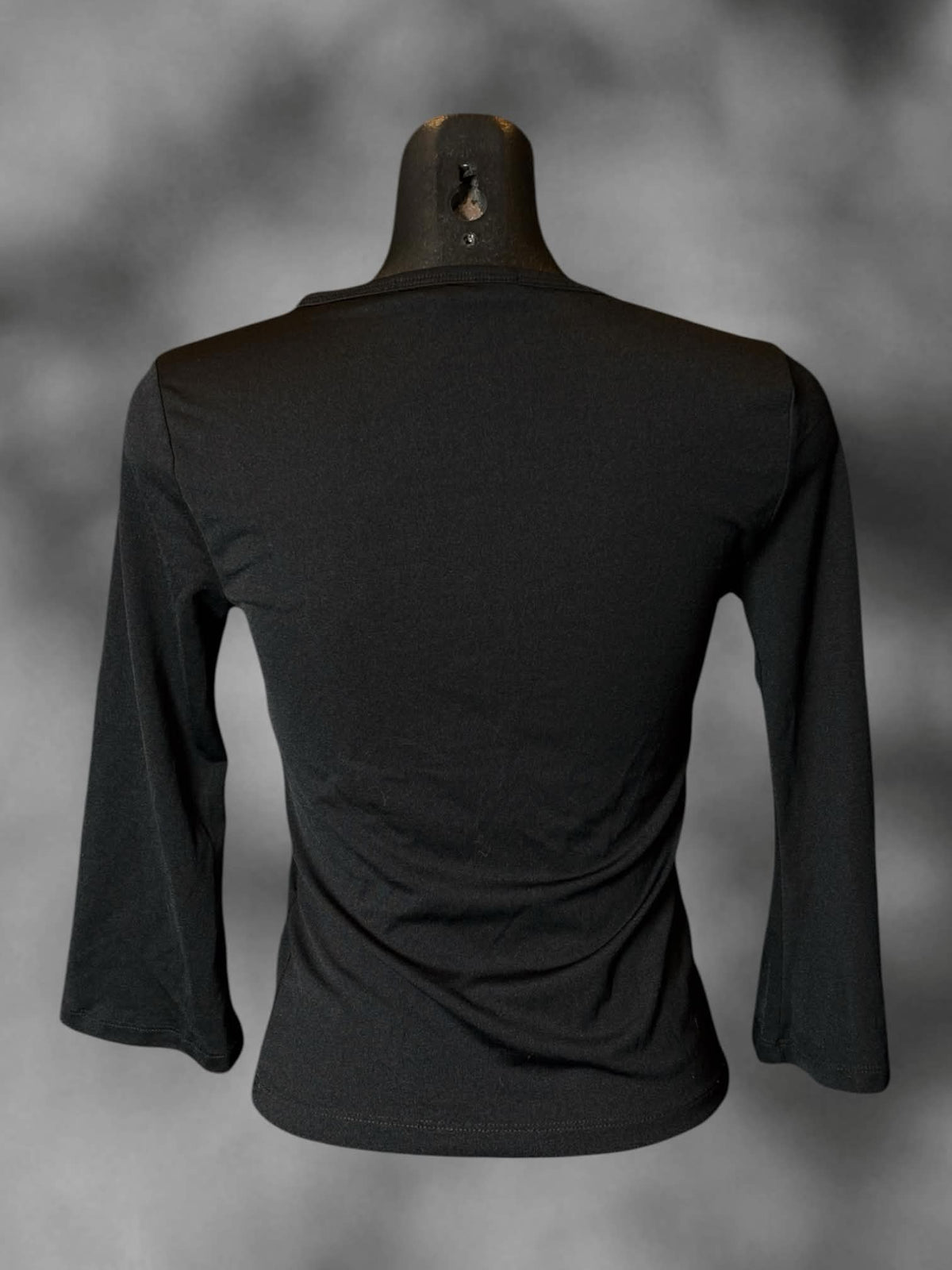 M Rampage Clothing Co vintage black fitted long-sleeve shirt with sparkly Y2K floral vector design on front, and bell sleeves