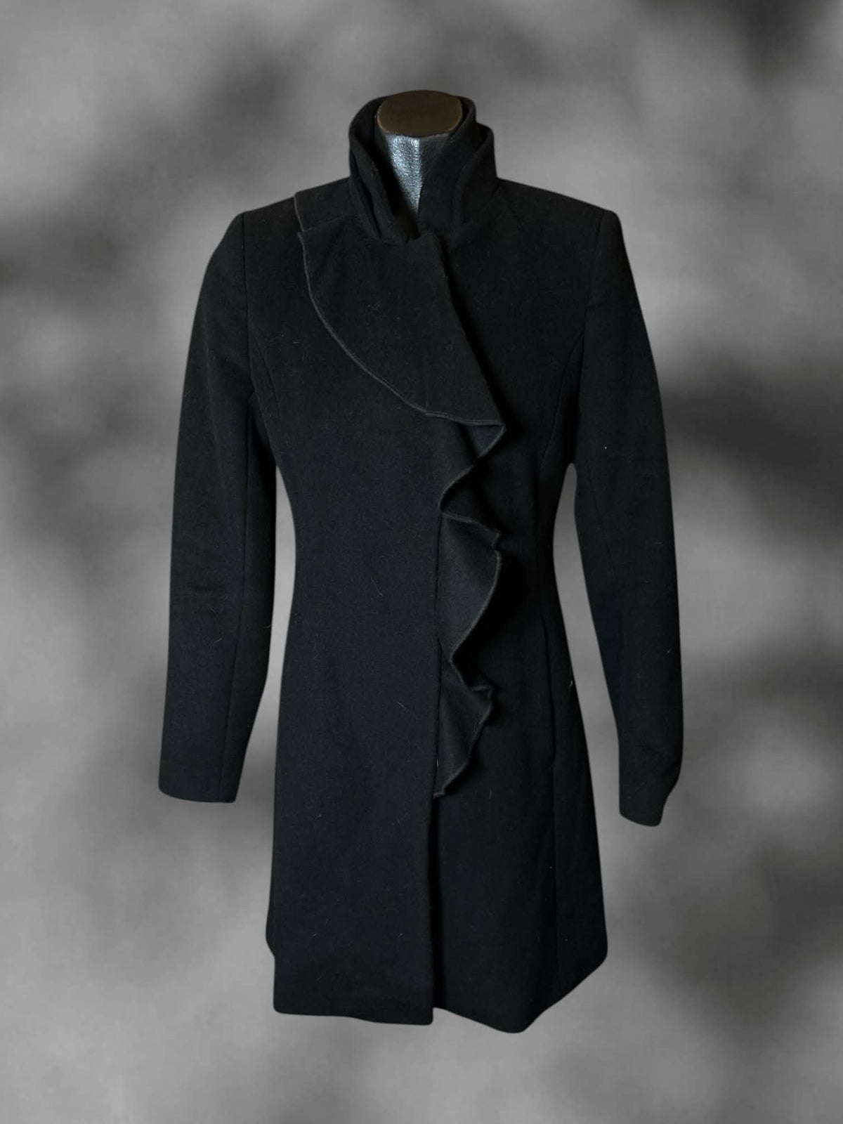 M DKNY black pea coat with snap buttons, and ruffle design on front