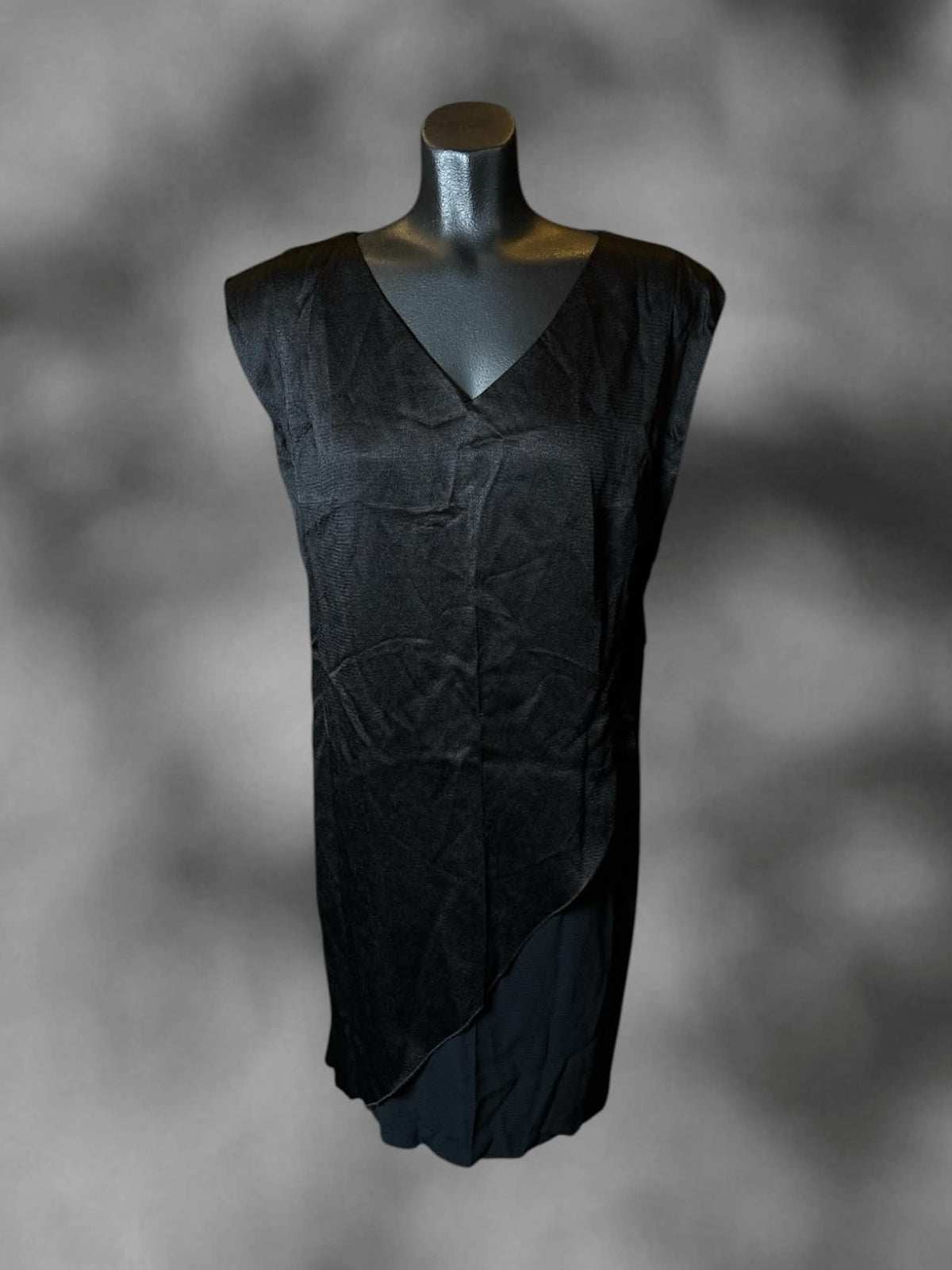 M Hugo designer black dress with layered asymmetrical design on front, and zipper on back
