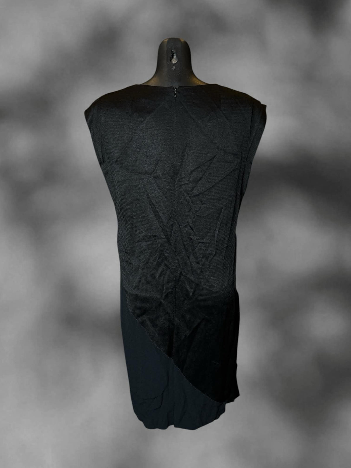 M Hugo designer black dress with layered asymmetrical design on front, and zipper on back
