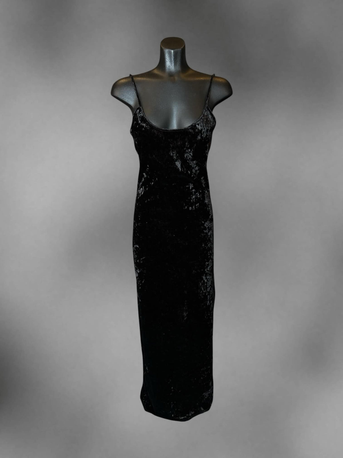 M Loveriche black crushed velvet dress with cross straps on back, and slit in skirt