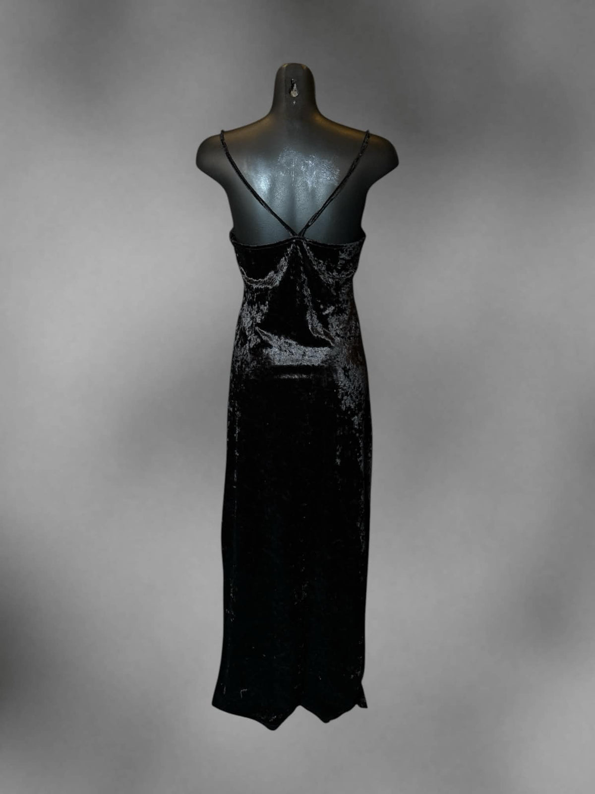 M Loveriche black crushed velvet dress with cross straps on back, and slit in skirt