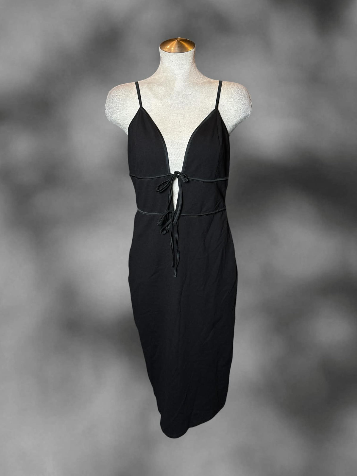 L Social Tourist NWT black dress with cutout design on front, zipper on side, and adjustable straps