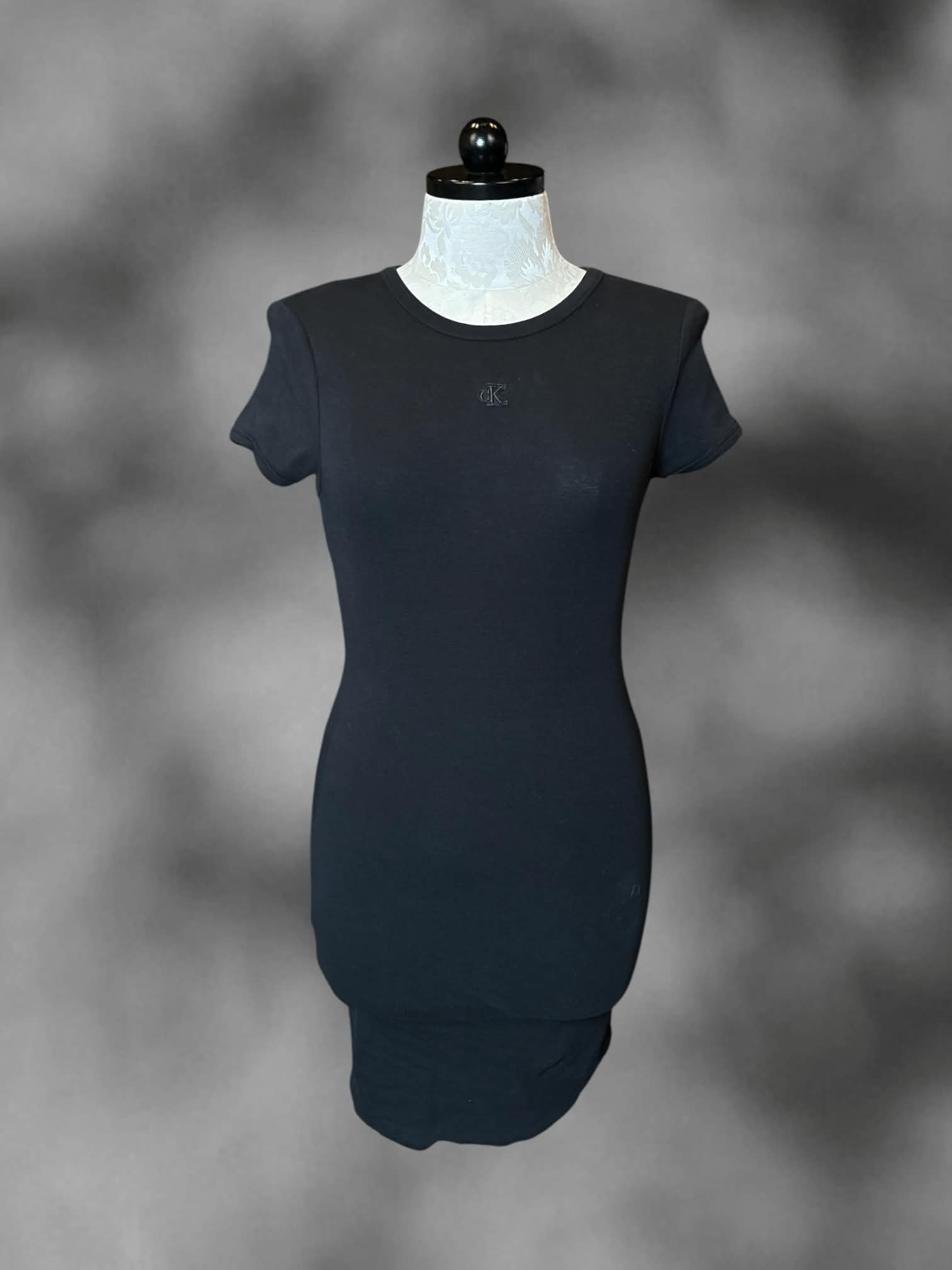 0X Calvin Klein black short-sleeve dress with embroidered “CK” on front