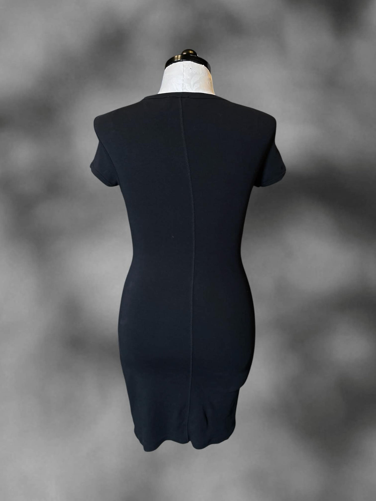 0X Calvin Klein black short-sleeve dress with embroidered “CK” on front