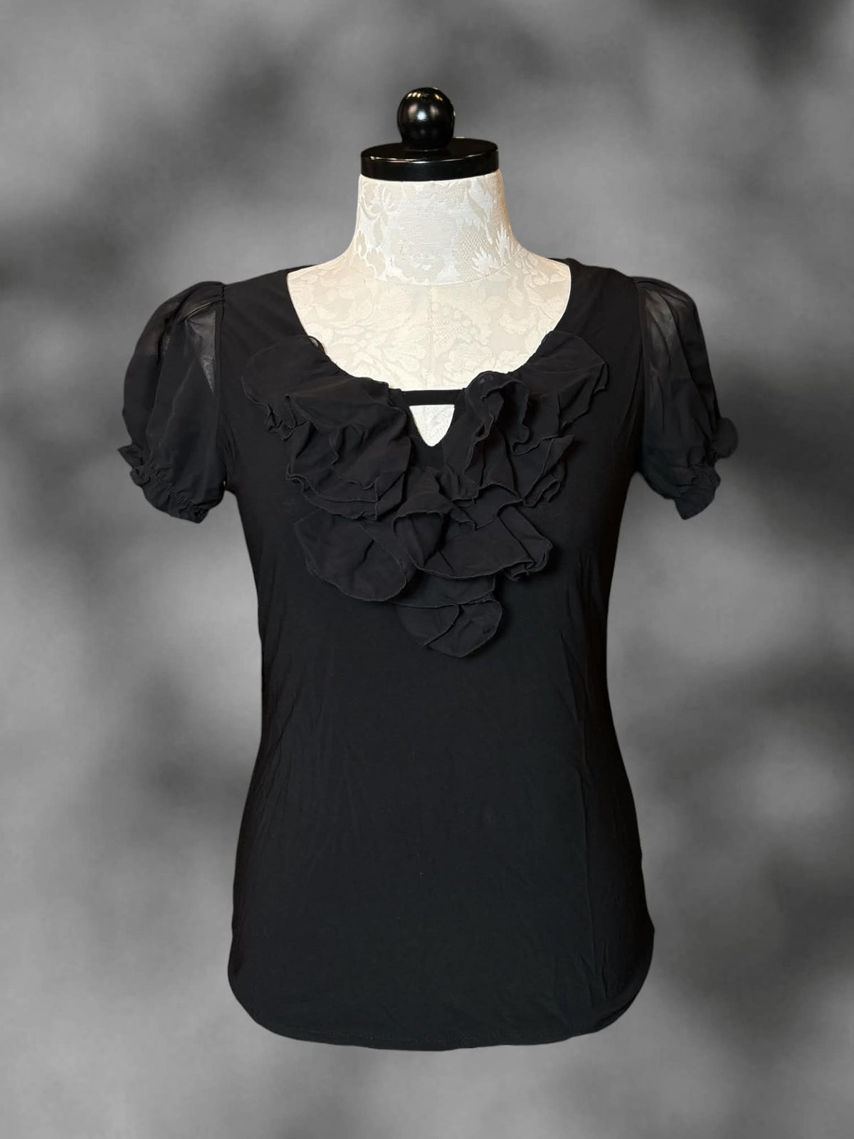 1X White House Black Market black blouse with sheer ruffle sleeves, and ruffle design on front