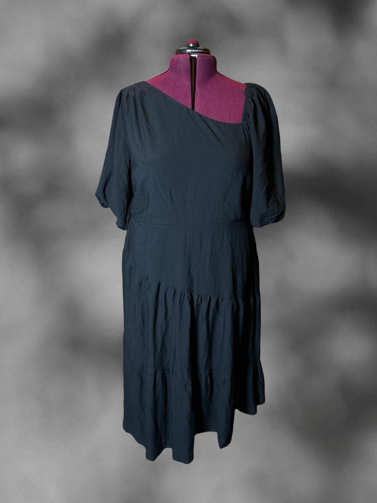 2X City Chic NWT black dress with asymmetrical neckline design, and layered skirt
