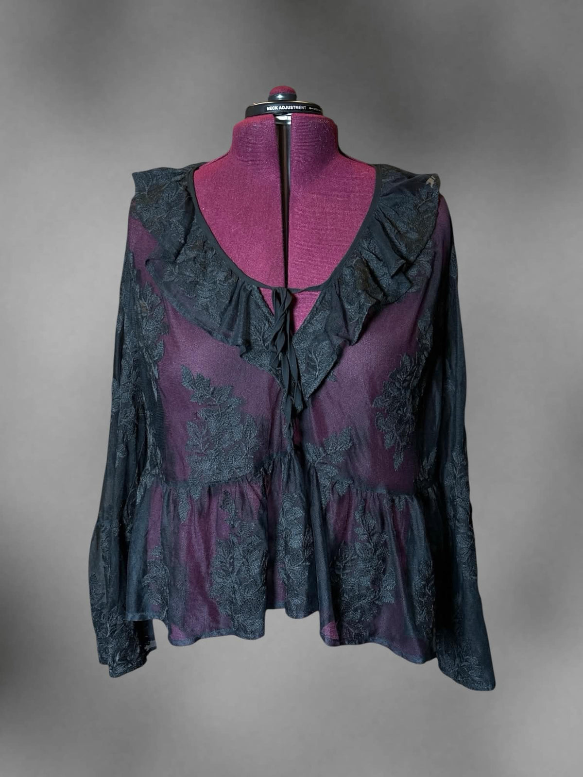 3X Festi black sheer lace long-sleeve blouse with bell sleeves, and ruffle hemline