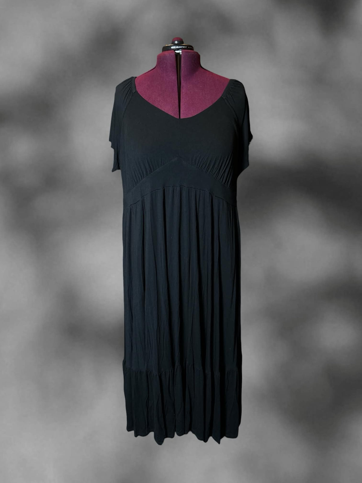 4X Torrid black dress with empire waist seem, and pockets