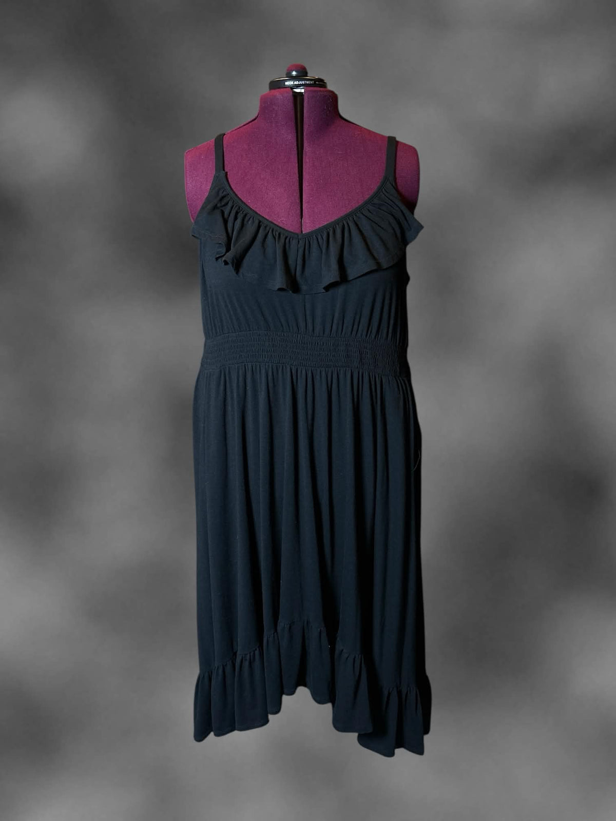 6X Torrid black dress with cutout on back; ruffle design on front, and adjustable straps
