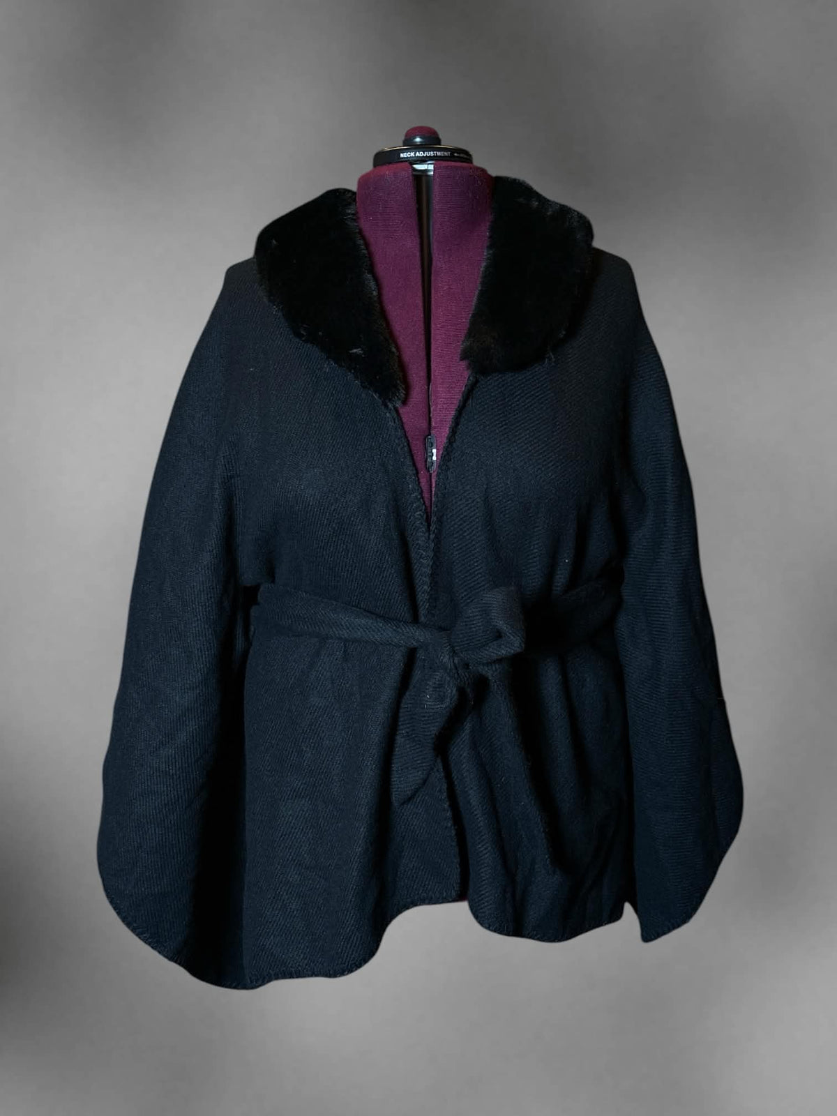 One Size Torrid NWT black shawl with faux fur collar, and tie around waist