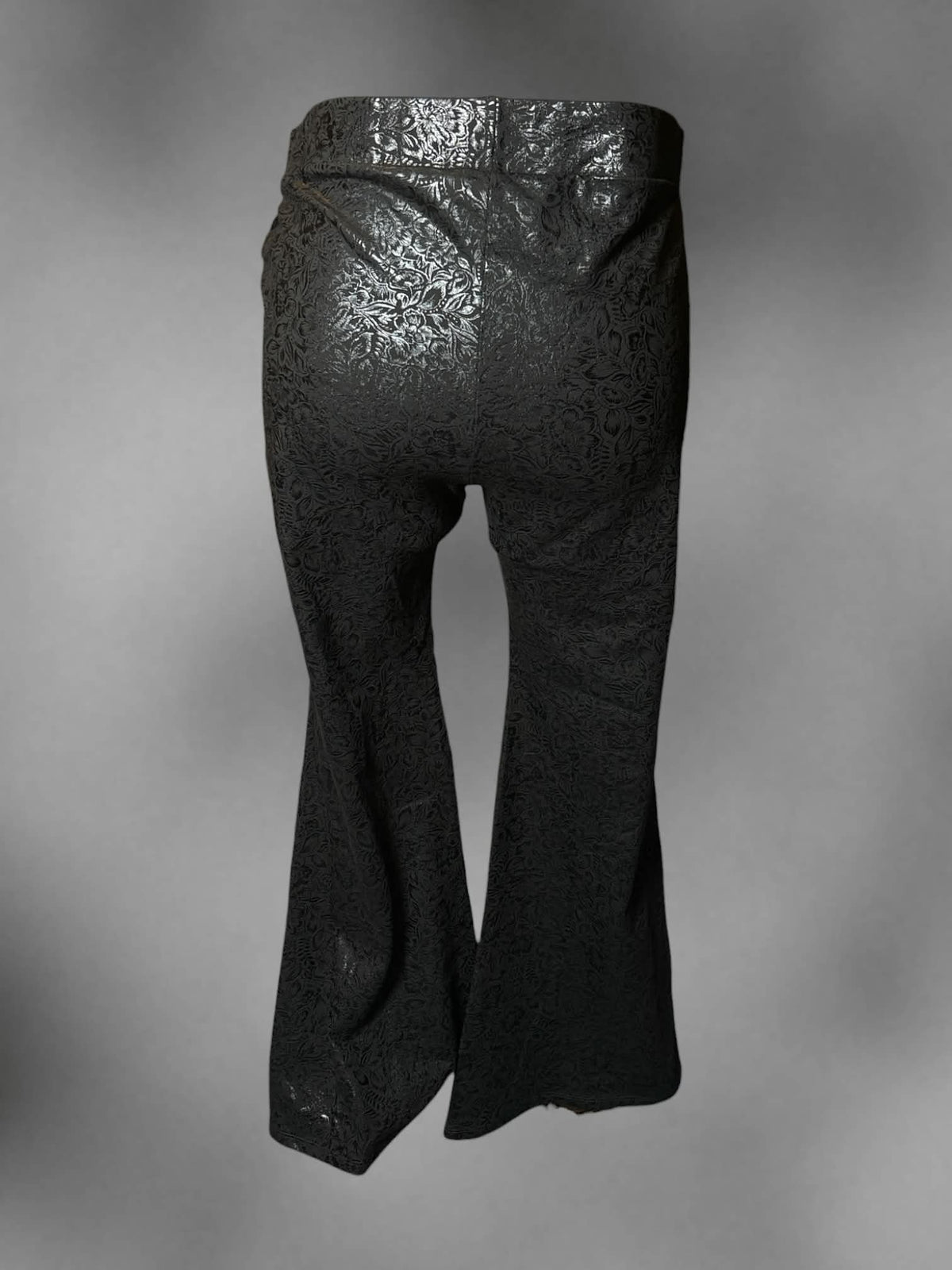 2X Torrid black soft flare pants with floral metallic pattern, pockets, and stretch waist