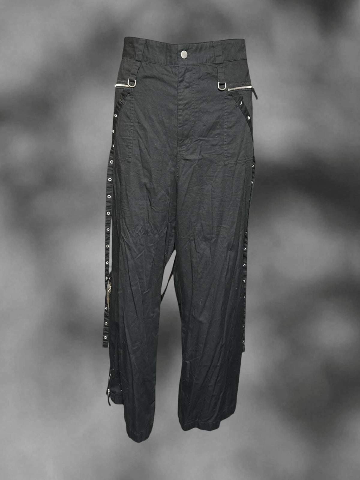 3X Torrid black high-waisted pants with zipper pockets, and decorative metallic loops