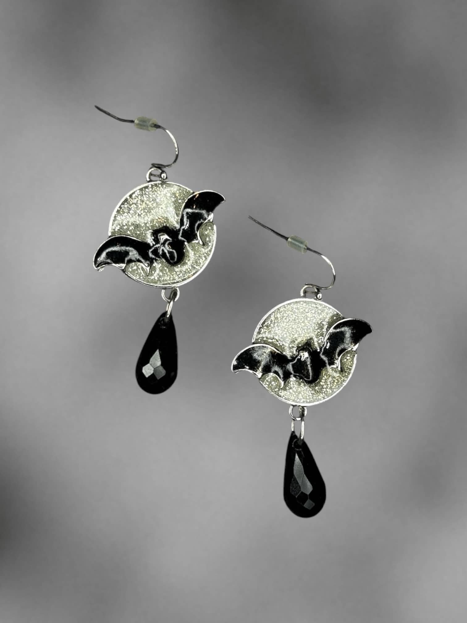 Silver glitter moon bat earrings with black beaded charm