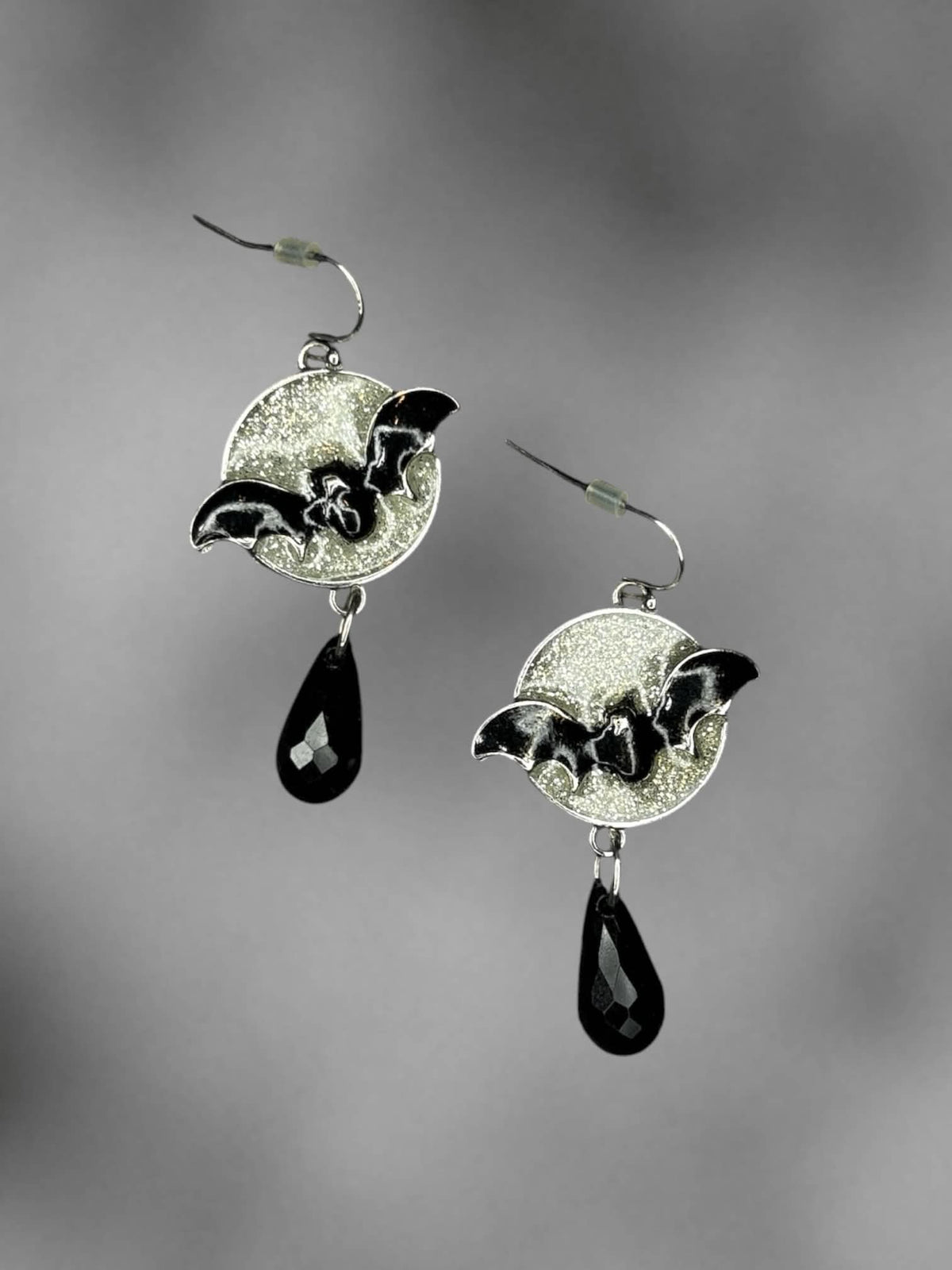 Silver glitter moon bat earrings with black beaded charm